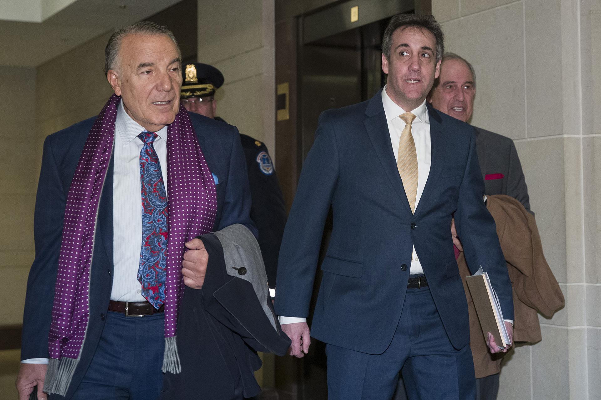 Michael Cohen, right, President Donald Trump's former personal lawyer, arrives to testify before a closed-door hearing of the House Intelligence Committee accompanied by his lawyer, Michael Monico of Chicago, on Capitol Hill, Thursday, Feb. 28, 2019. (AP Photo / Alex Brandon)