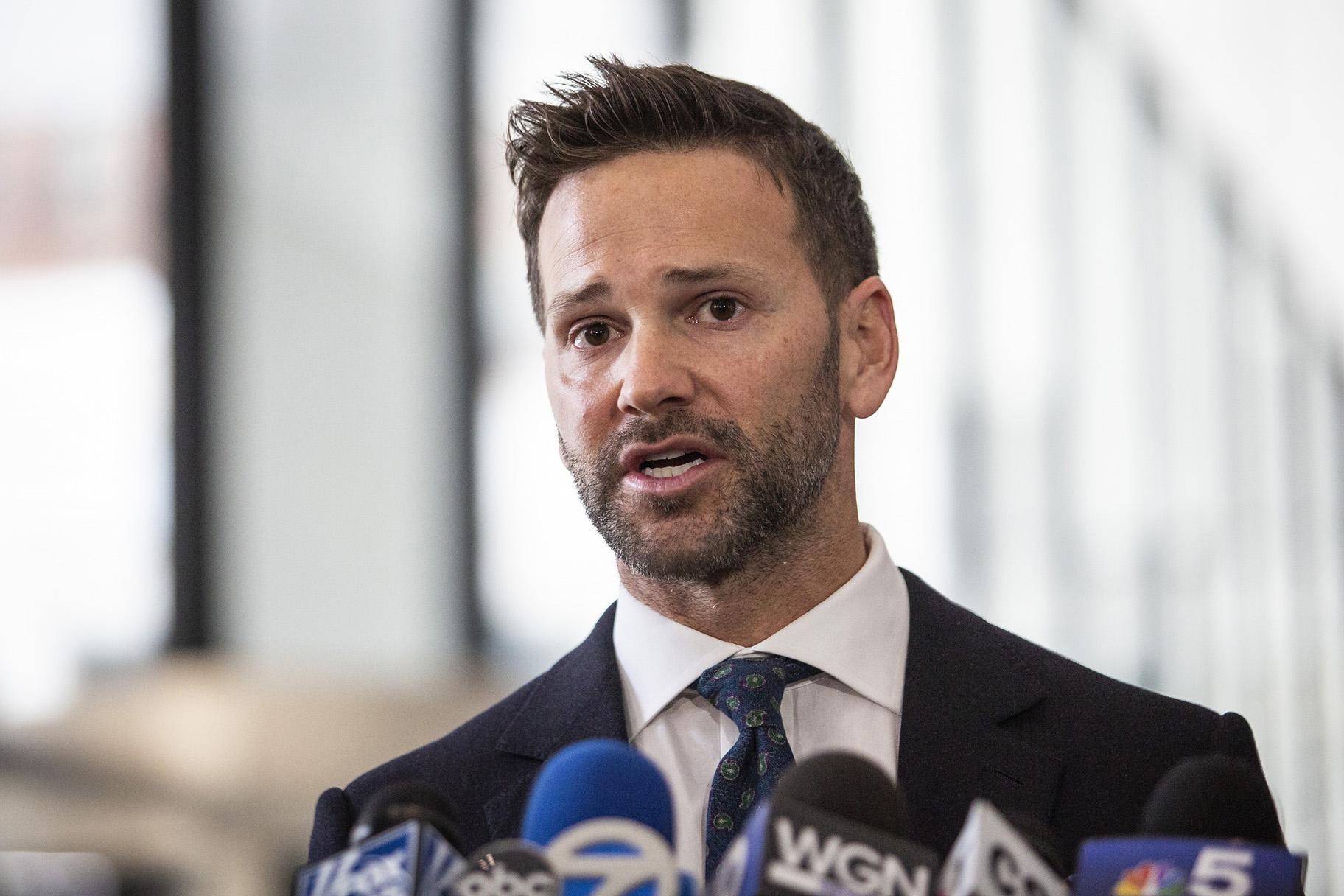 Former U.S. Rep. Aaron Schock speaks to reporters at the Dirksen Federal Courthouse on Wednesday, March 6, 2019. (Ashlee Rezin / Chicago Sun-Times via AP)