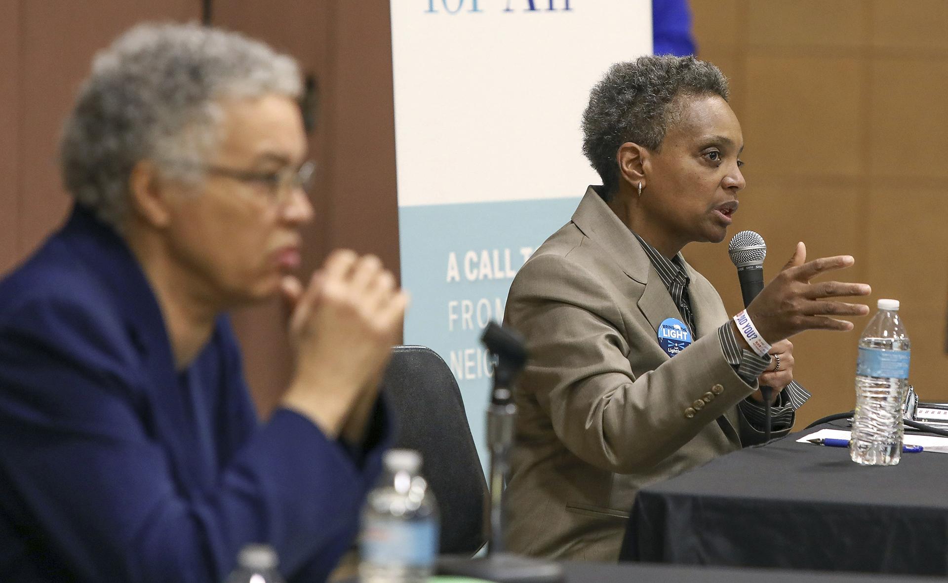 In this March 24, 2019 photo, Chicago mayoral candidate Lori Lightfoot, right, participates in a candidate forum sponsored by One Chicago For All Alliance at Daley College in Chicago. (AP Photo / Teresa Crawford)