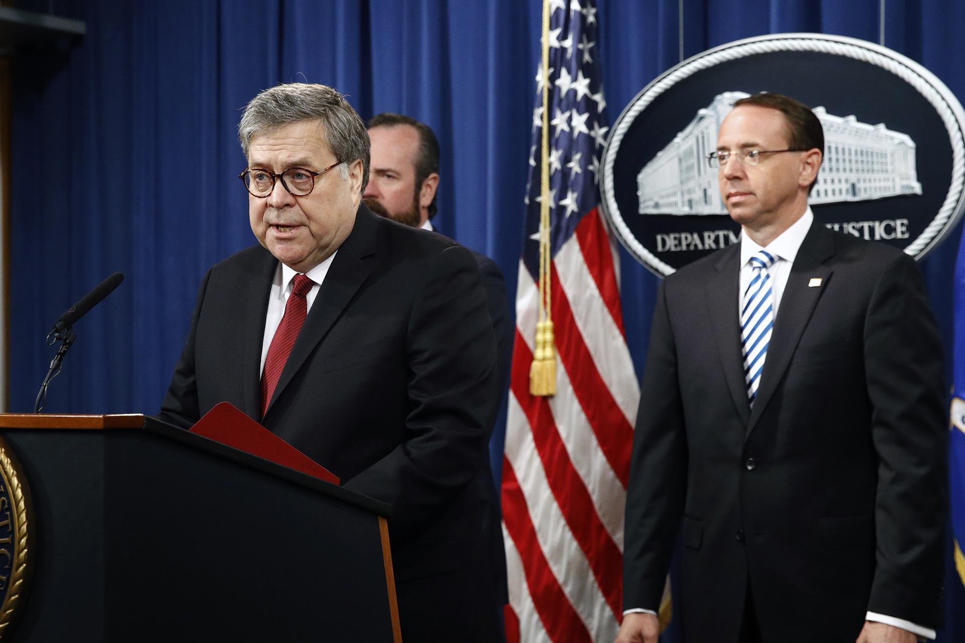 Attorney General William Barr speaks alongside Deputy Attorney General Rod Rosenstein, right, and Deputy Attorney General Ed O’Callaghan, rear left, about the release of a redacted version of special counsel Robert Mueller'’s report during a news conference, Thursday, April 18, 2019, at the Department of Justice in Washington. (AP Photo / Patrick Semansky)