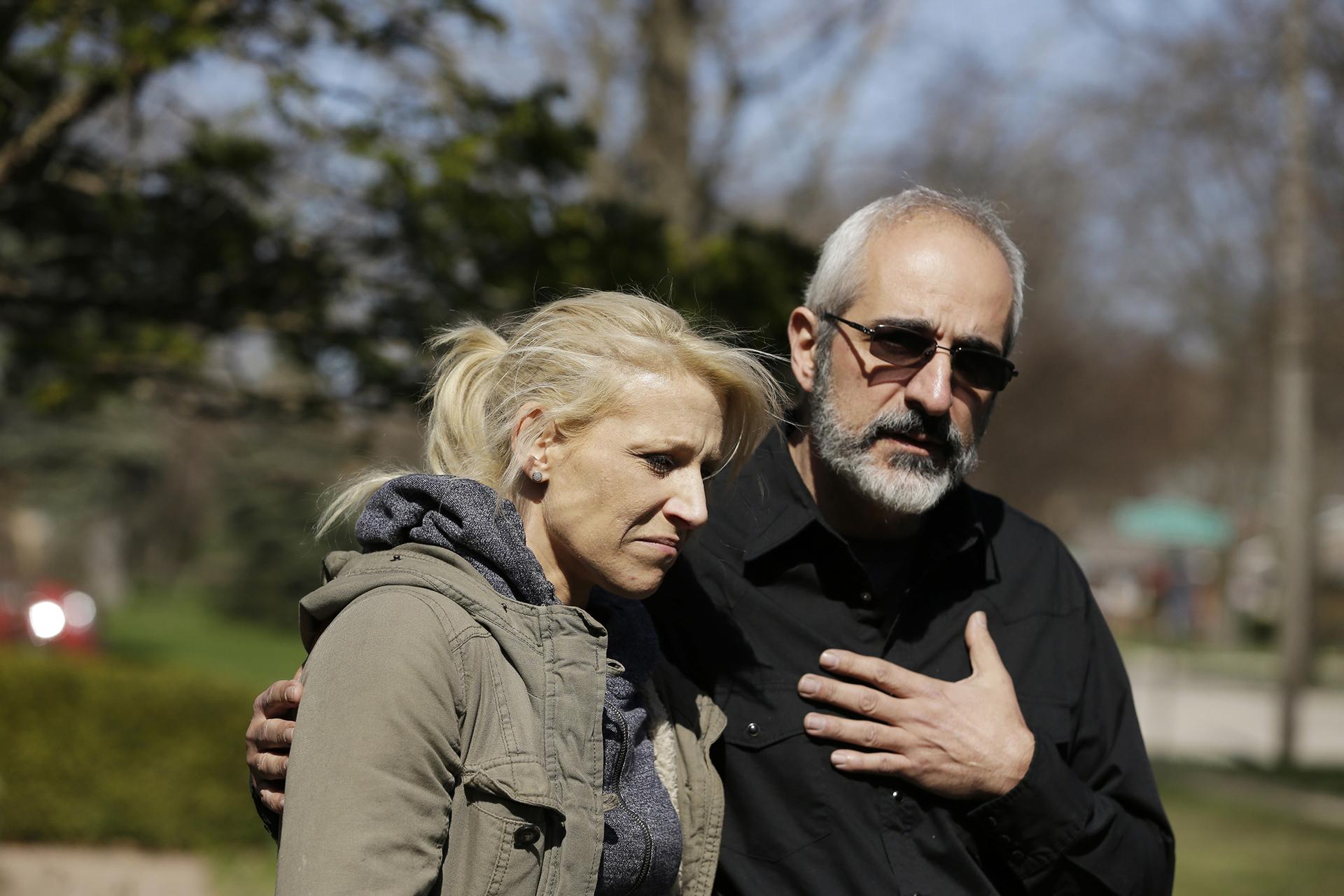 JoAnn Cunningham, mother of missing 5-year-old child Andrew “AJ” Freund, stands with her attorney George Kililis outside of the Freund home as he speaks on her behalf and pleads with the public to help find AJ on Friday, April 19, 2019 in Crystal Lake. (Stacey Wescott / Chicago Tribune via AP)