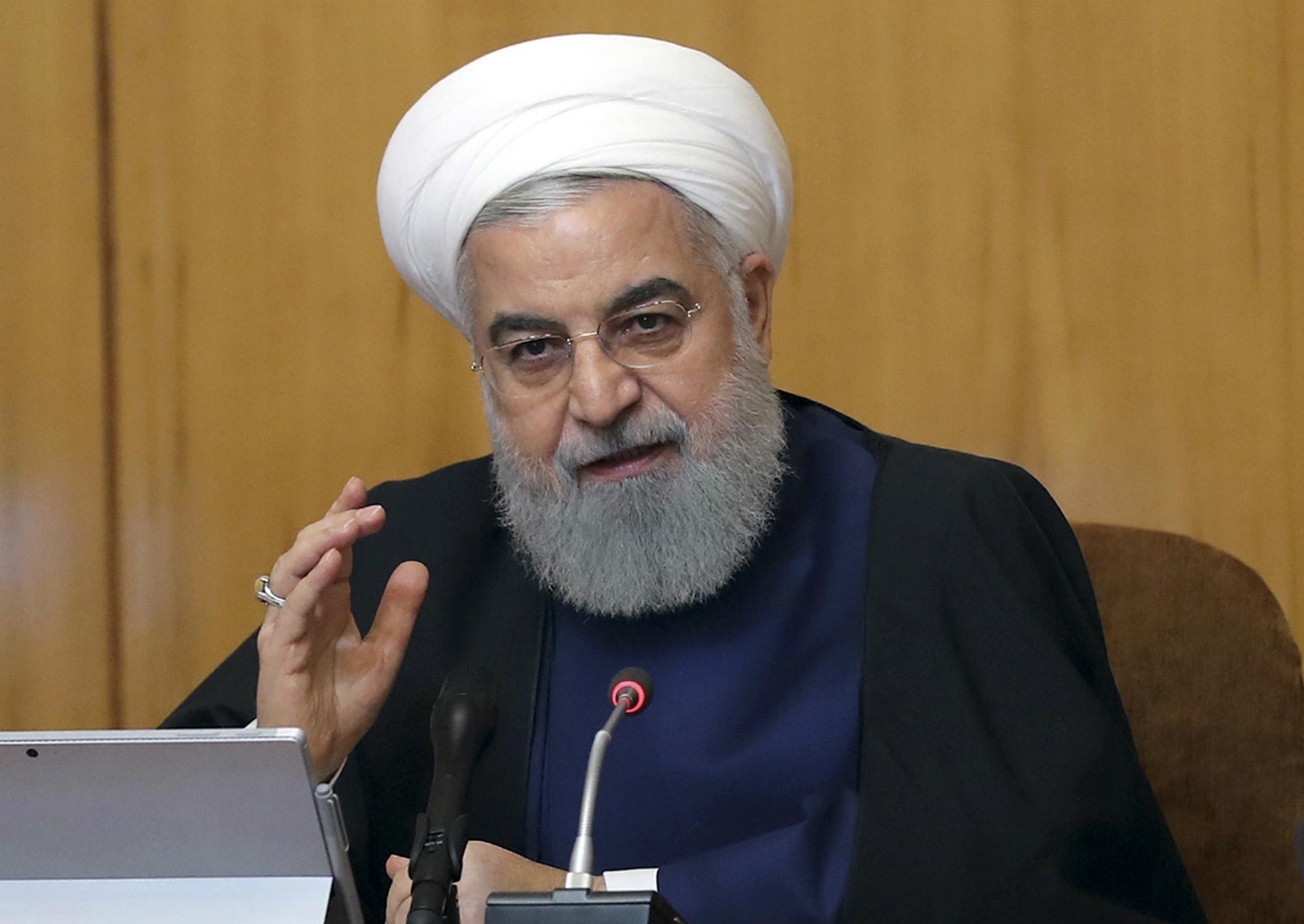 In this photo released by the official website of the office of the Iranian Presidency, President Hassan Rouhani speaks in a cabinet meeting in Tehran, Iran, Wednesday, May 8, 2019. (Iranian Presidency Office via AP)