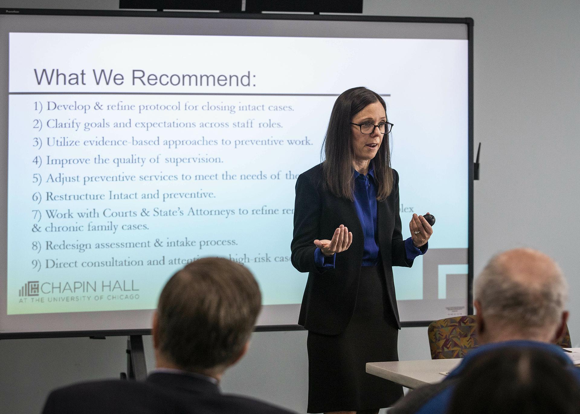 In this May 13, 2019 photo, Dana Weiner, policy fellow at Chapin Hall at the University of Chicago, discusses a review of the Illinois Department of Children and Family Services’ Intact Family Services program, during a press event at DCFS. (Ashlee Rezin/Sun Times via AP)
