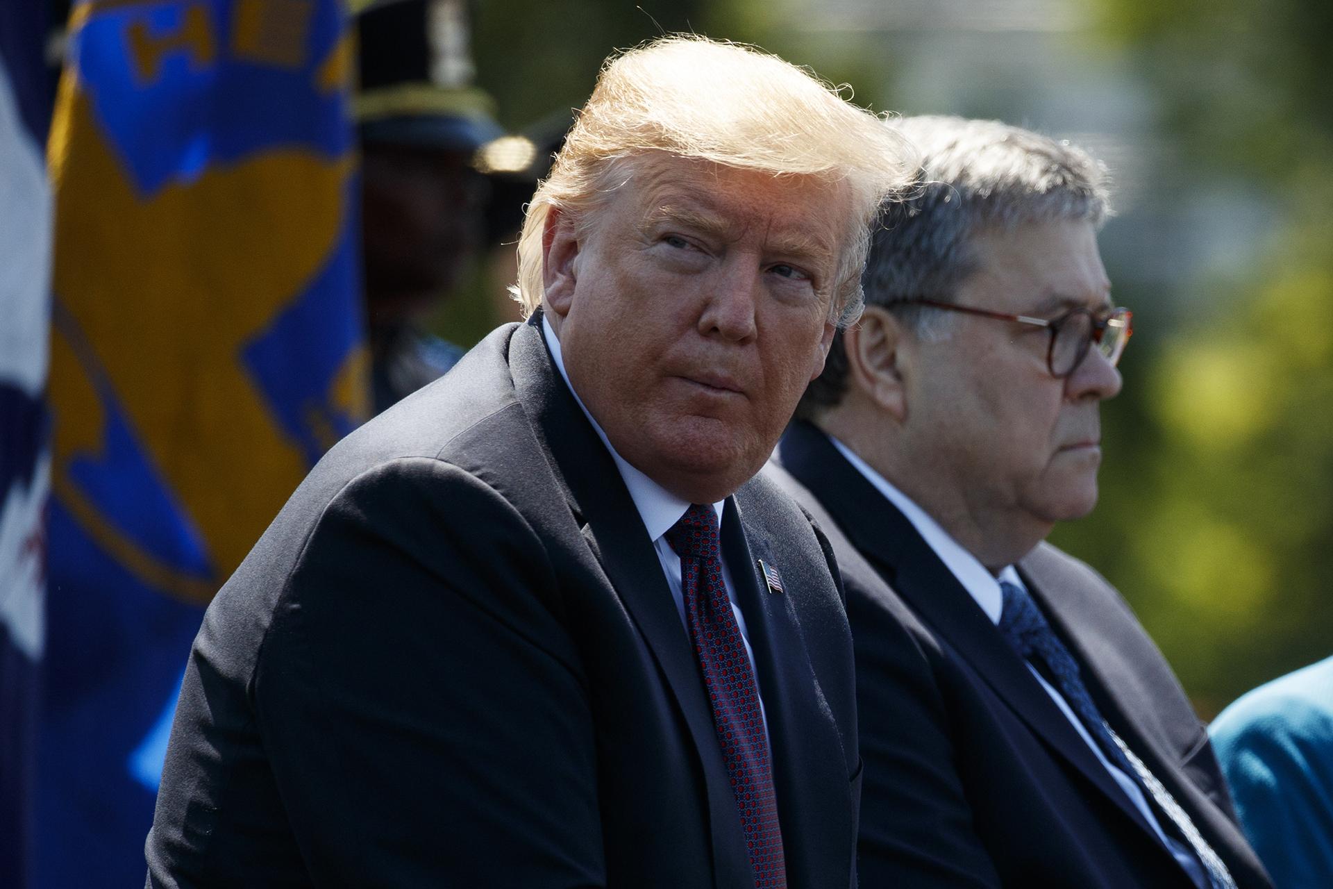 President Donald Trump sits with Attorney General William Barr during the 38th Annual National Peace Officers’ Memorial Service at the U.S. Capitol, Wednesday, May 15, 2019, in Washington. (AP Photo / Evan Vucci)