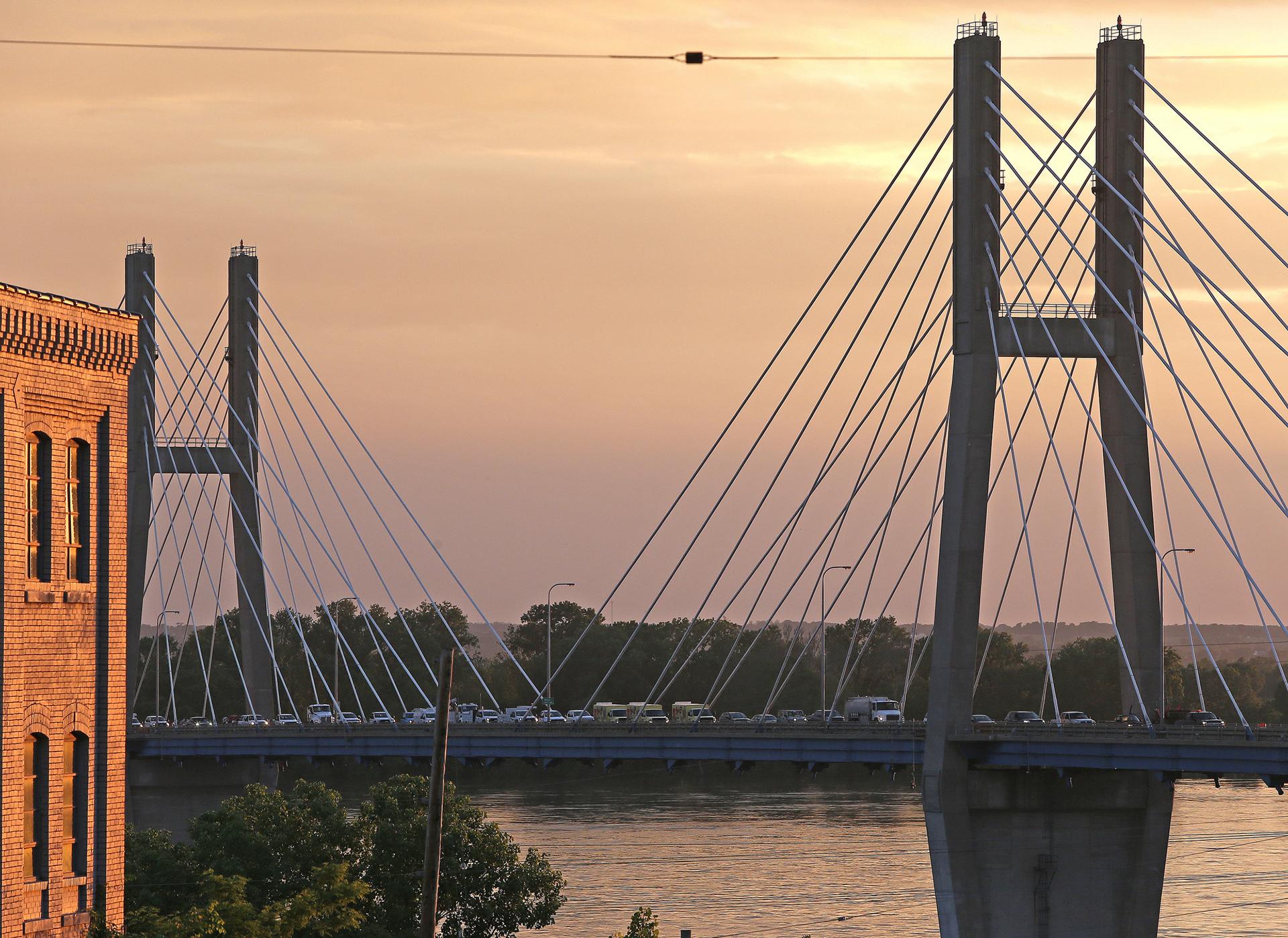 Traffic gets backed up on the Bayview Bridge as vehicles are rerouted in Quincy, Illinois on Thursday, May 30, 2019, after it was closed due to rising Mississippi River waters. The bridge connects Illinois to Missouri via U.S. Route 24. (Jake Shane / Quincy Herald-Whig via AP)