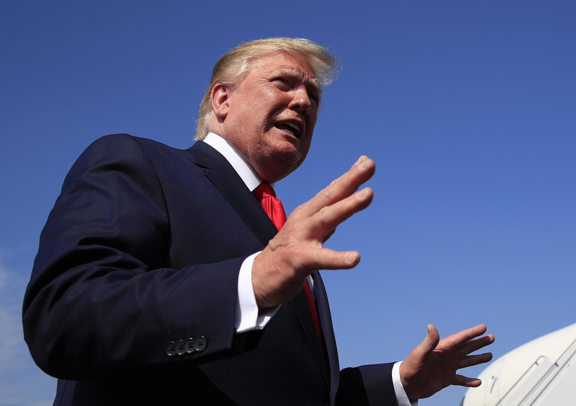 President Donald Trump speaks at Morristown Municipal Airport in Morristown, New Jersey, on his way returning back to the White House, Sunday, July 7, 2019. (AP Photo / Manuel Balce Ceneta)