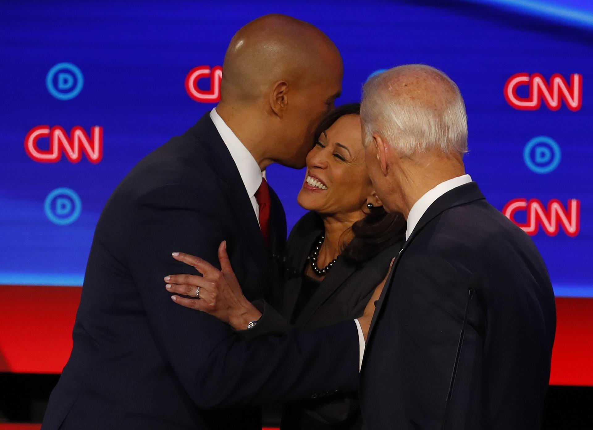 Sen. Cory Booker, D-New Jersey, former Vice President Joe Biden and Sen. Kamala Harris, D-California, talk after the second of two Democratic presidential primary debates hosted by CNN Wednesday, July 31, 2019, in the Fox Theatre in Detroit. (AP Photo / Paul Sancya)