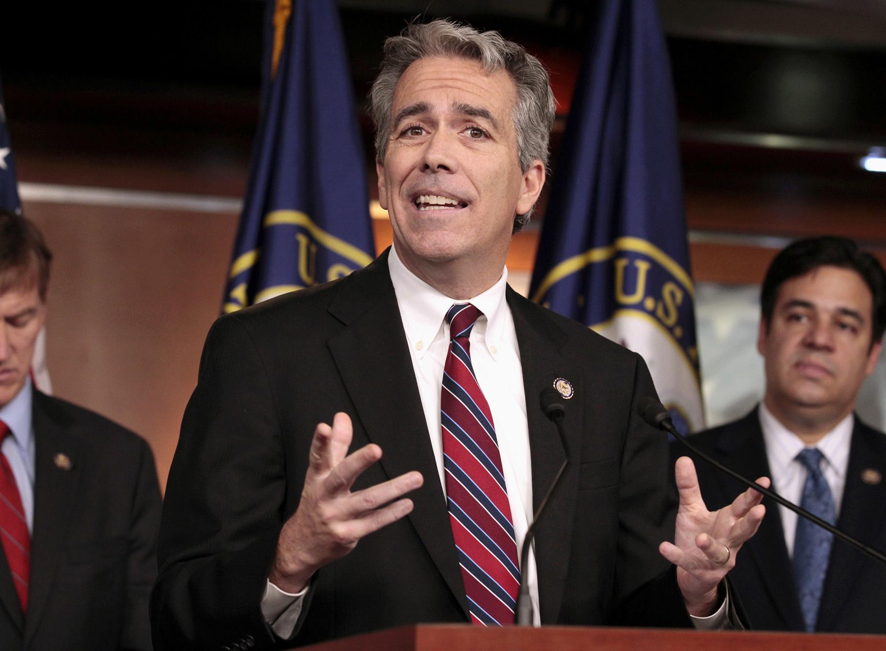 In this Nov. 15, 2011, file photo former U.S. Rep. Joe Walsh, R-Ill., gestures during a news conference on Capitol Hill in Washington. (AP Photo / Carolyn Kaster, File)