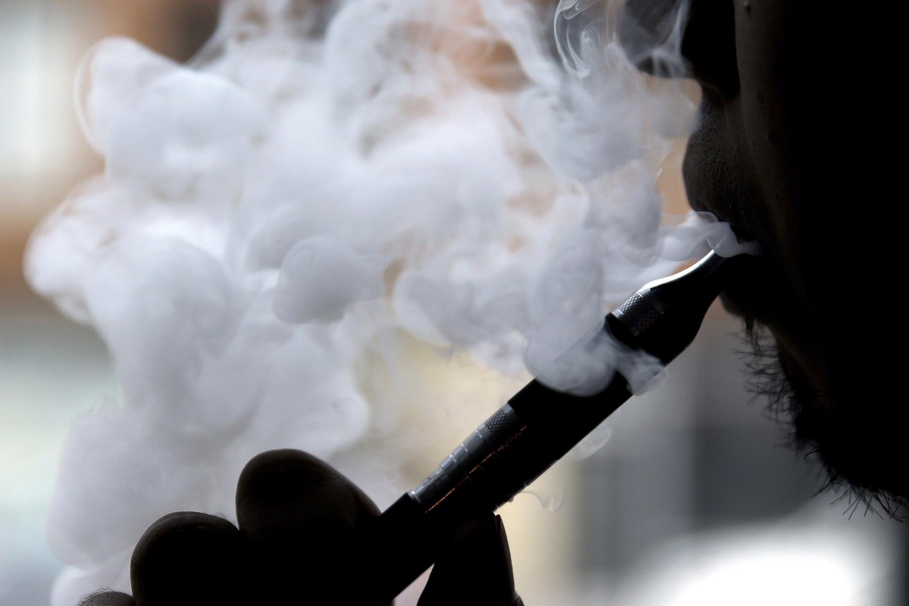 In this April 23, 2014 file photo, a man smokes an electronic cigarette in Chicago. (AP Photo / Nam Y. Huh, File)