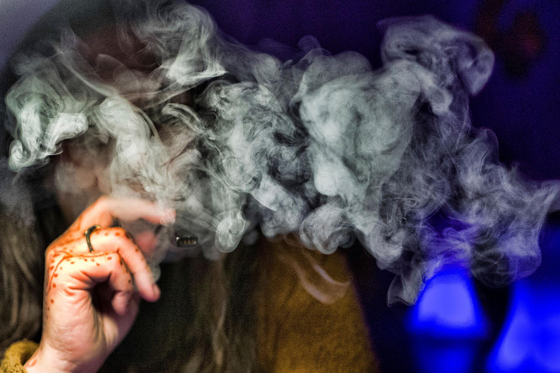 In this Saturday, Dec. 22, 2018 file photo, a woman takes a puff from a cannabis vape pen in Los Angeles. (AP Photo / Richard Vogel)