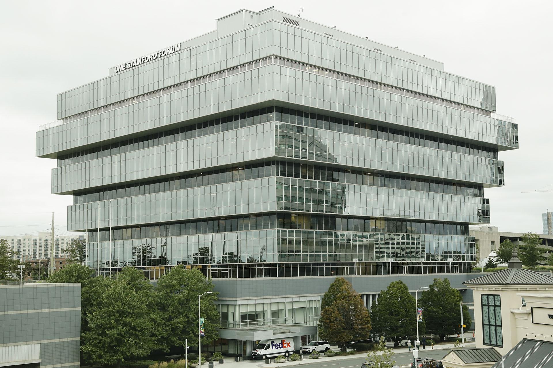 Cars pass Purdue Pharma headquarters Thursday, Sept. 12, 2019, in Stamford, Connecticut. (AP Photo / Frank Franklin II)