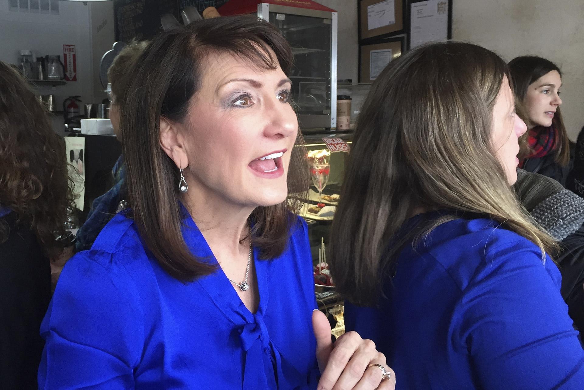 In this Feb. 13, 2018, file photo Marie Newman speaks with supporters at a campaign event in LaGrange, Illinois. (AP Photo by Sara Burnett, File)