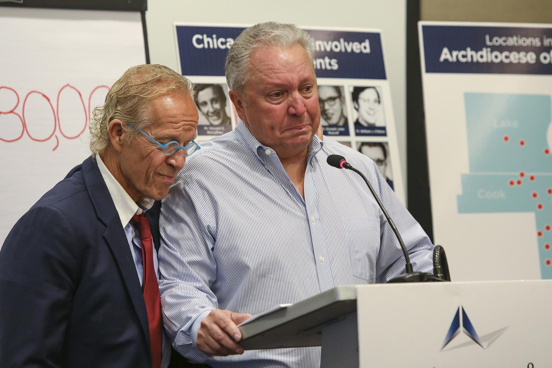 Jeff Anderson, an attorney for victims of sexual abuse by clergy, is joined by abuse victim Joe Iacono as he speaks during a press conference in Chicago, Sept. 17, 2019. (AP Photo / Teresa Crawford)
