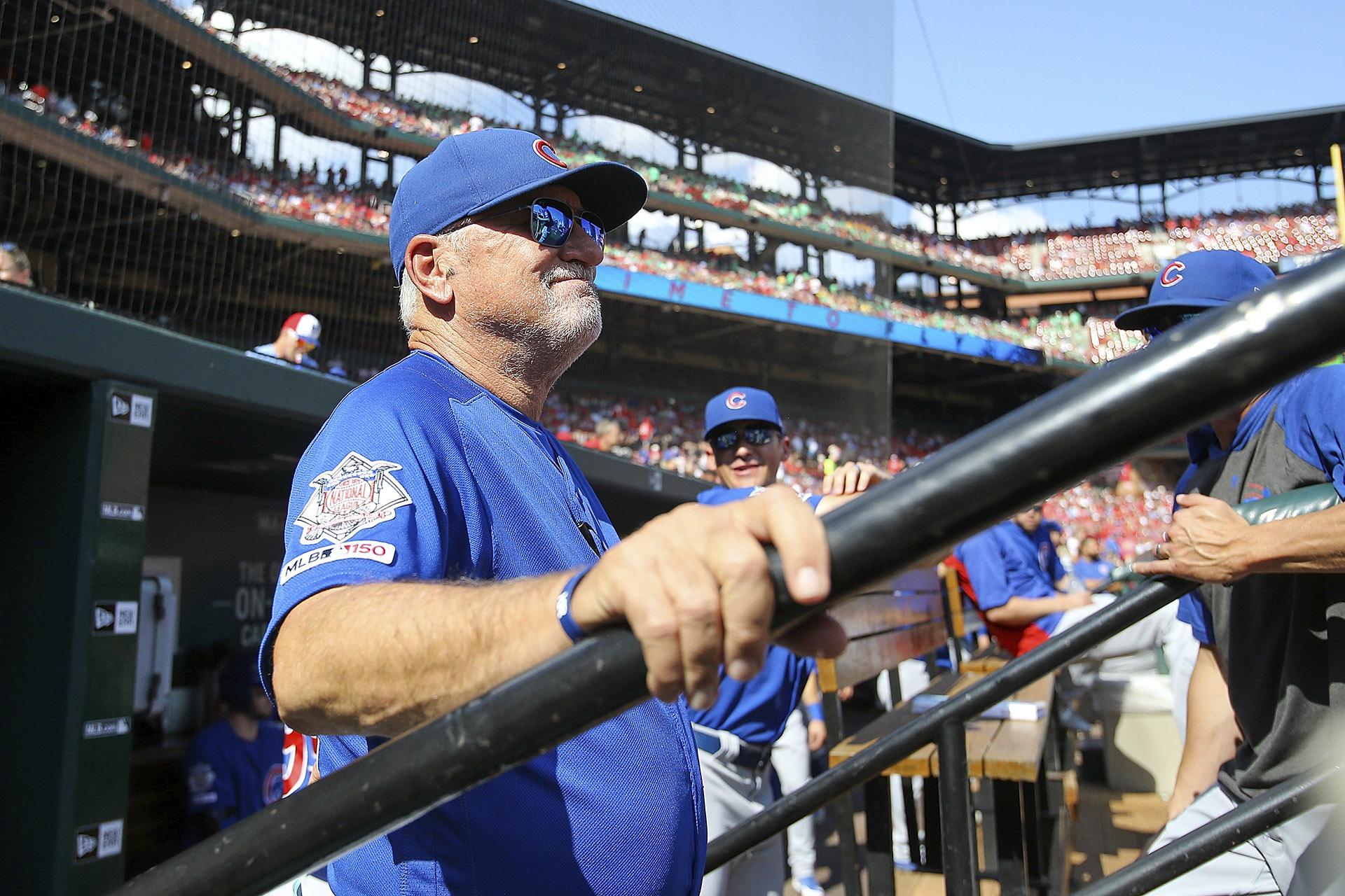 Chicago Cubs manager Joe Maddon looks out from the dugout prior to a baseball game against the St. Louis Cardinals, Sunday, Sept. 29, 2019, in St. Louis. (AP Photo / Scott Kane)