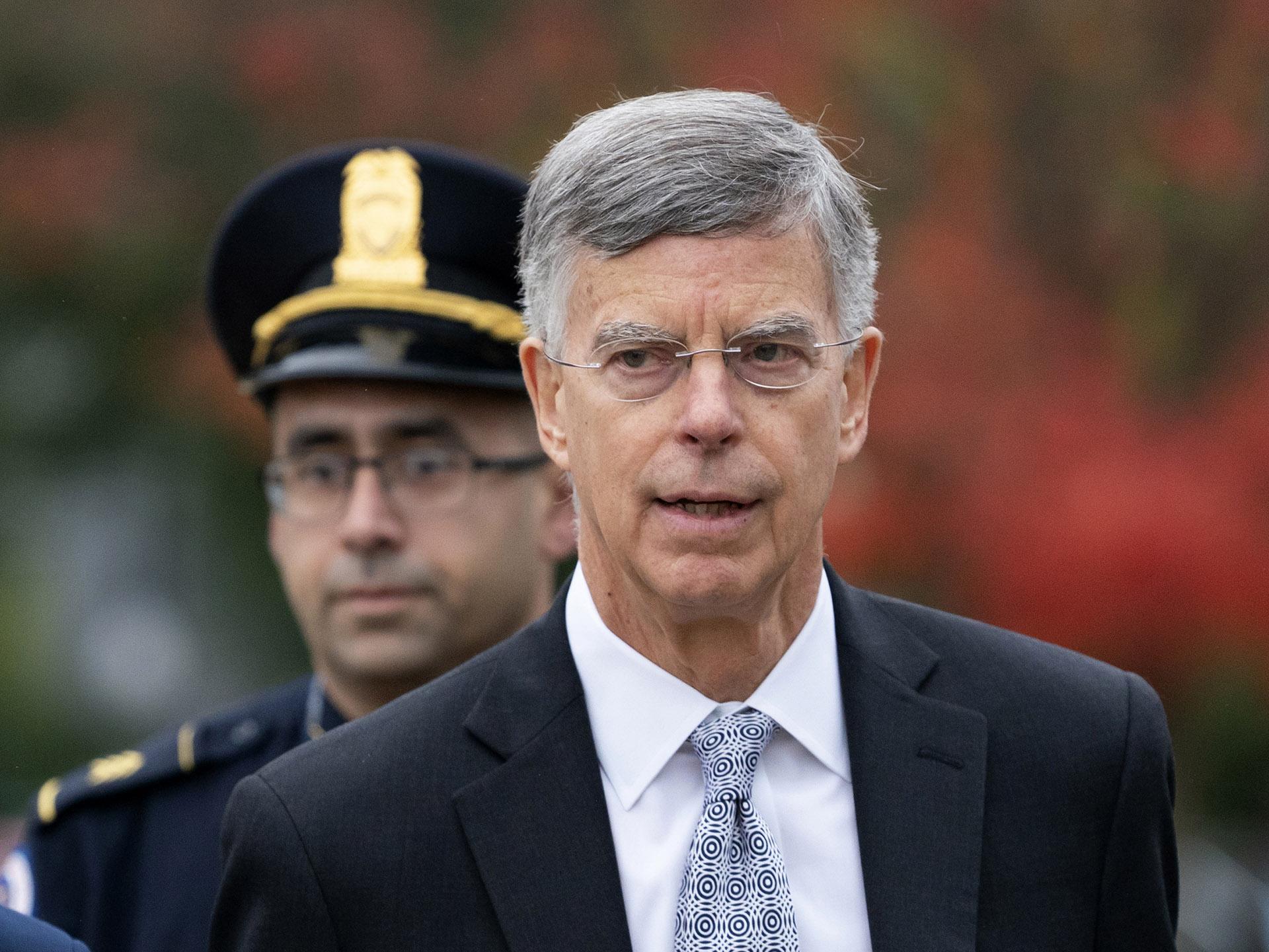 Ambassador William Taylor is escorted by U.S. Capitol Police as he arrives to testify before House committees as part of the Democrats’ impeachment investigation of President Donald Trump, at the Capitol in Washington, Tuesday, Oct. 22, 2019. (AP Photo / J. Scott Applewhite)