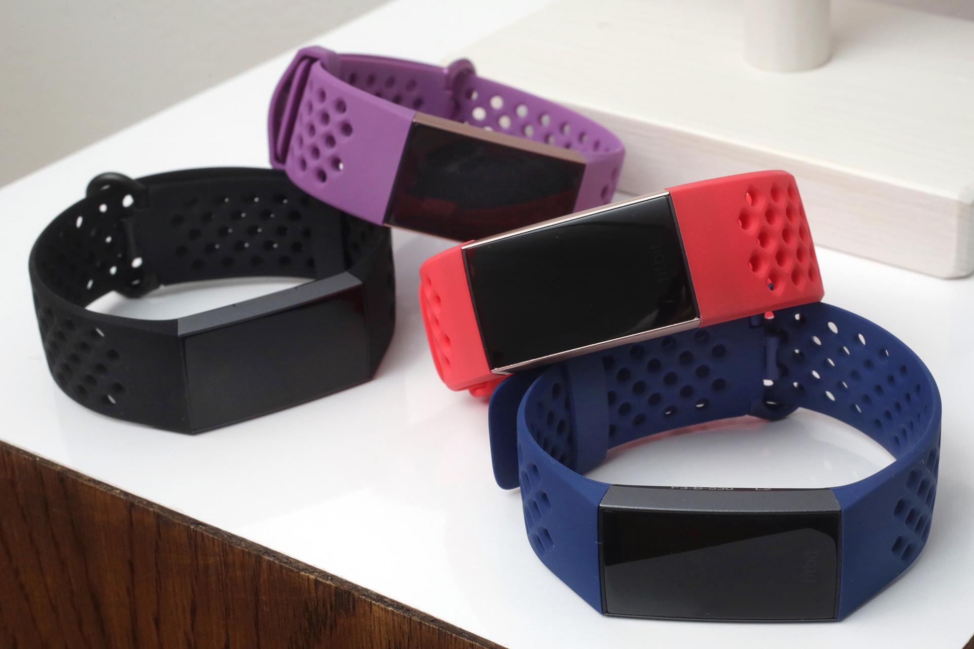 In this Aug. 16, 2018, file photo, the new Fitbit Charge 3 fitness trackers with sport bands are displayed in New York. (AP Photo / Richard Drew, File)