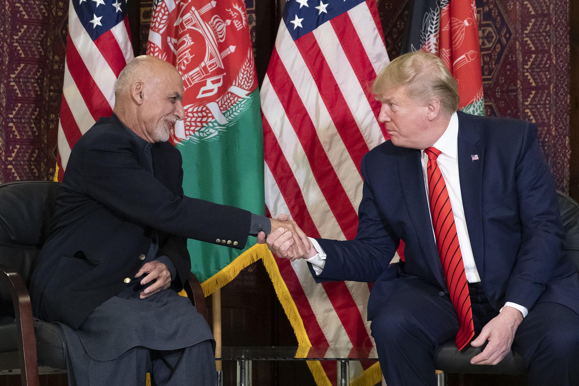 President Donald Trump shakes hands during a meeting with Afghan President Ashraf Ghani during a surprise Thanksgiving Day visit, Thursday, Nov. 28, 2019, at Bagram Air Field, Afghanistan. (AP Photo / Alex Brandon)