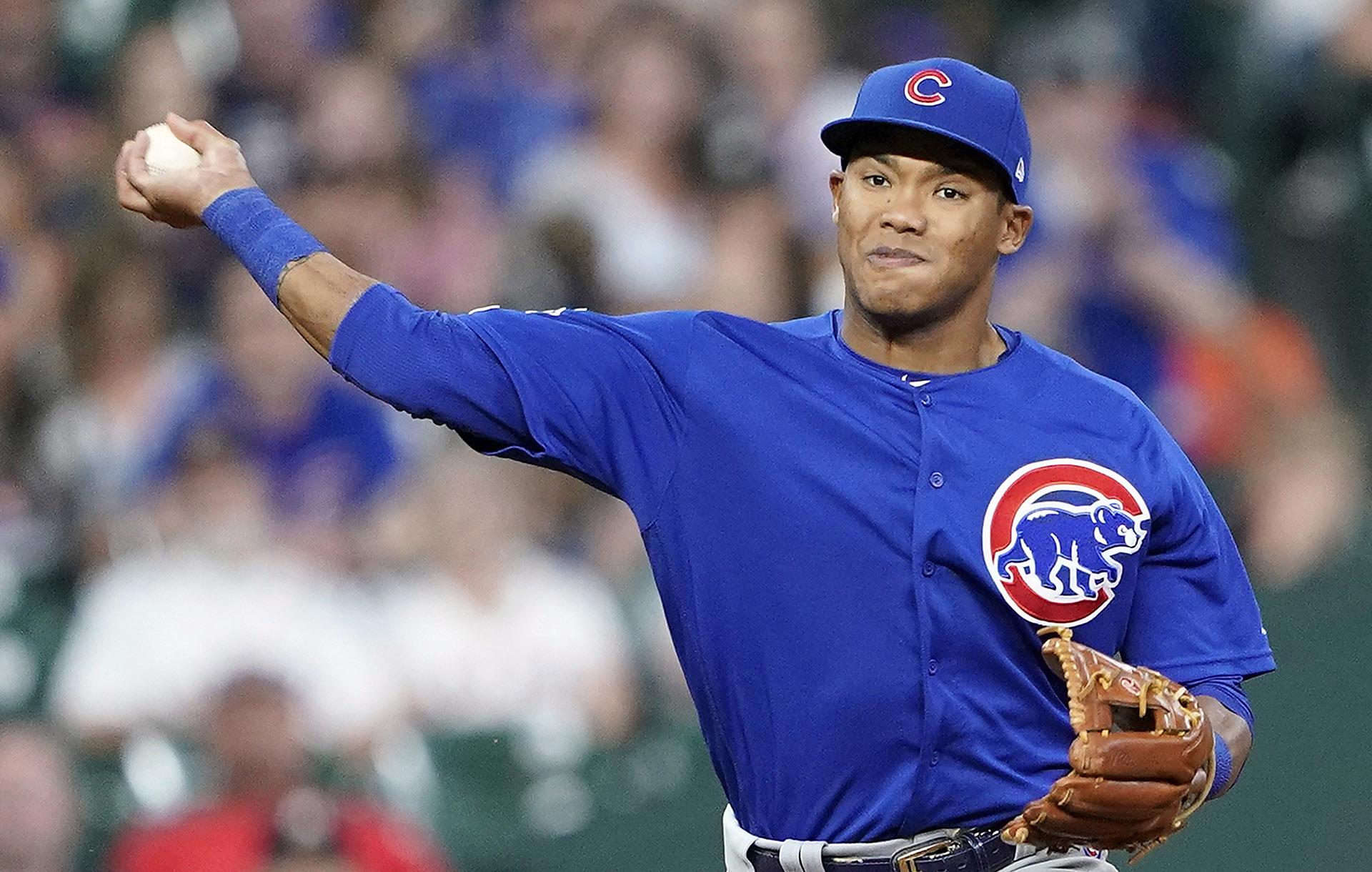 In this May 29, 2019, file photo, Chicago Cubs shortstop Addison Russell throws to first during the eighth inning of a baseball game against the Houston Astro in Houston. (AP Photo / David J. Phillip, File)