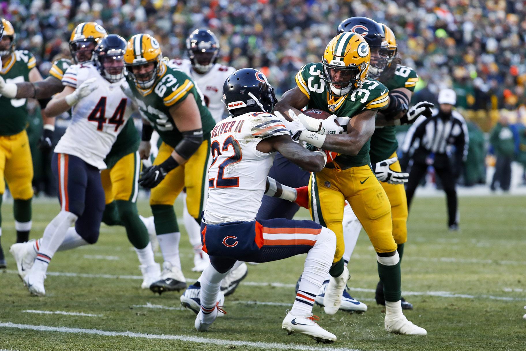 Green Bay Packers’ Aaron Jones runs for a touchdown during the second half of an NFL football game against the Chicago Bears Sunday, Dec. 15, 2019, in Green Bay, Wis. (AP Photo / Matt Ludtke