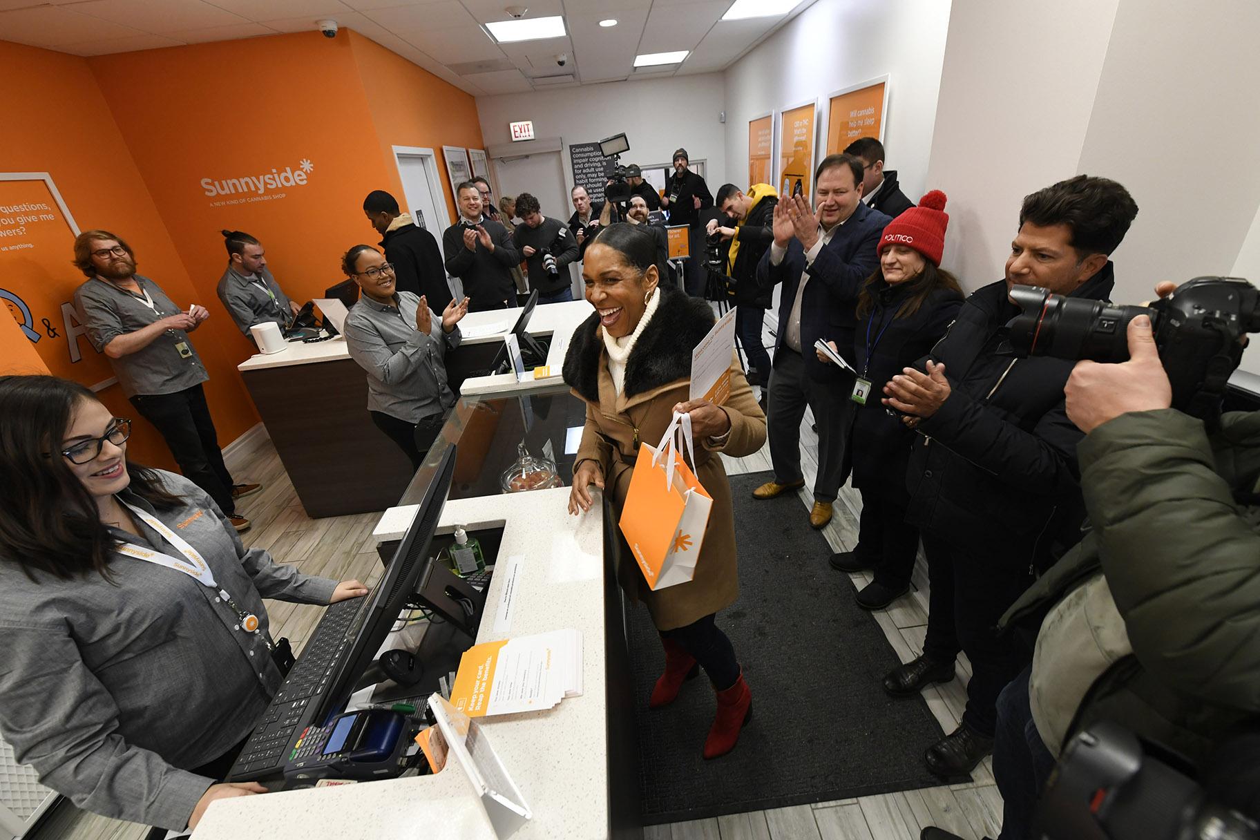 Illinois Lt. Gov. Juliana Stratton reacts after purchasing recreational marijuana at Sunnyside dispensary Wednesday, Jan. 1, 2020, in Chicago. (AP Photo / Paul Beaty)