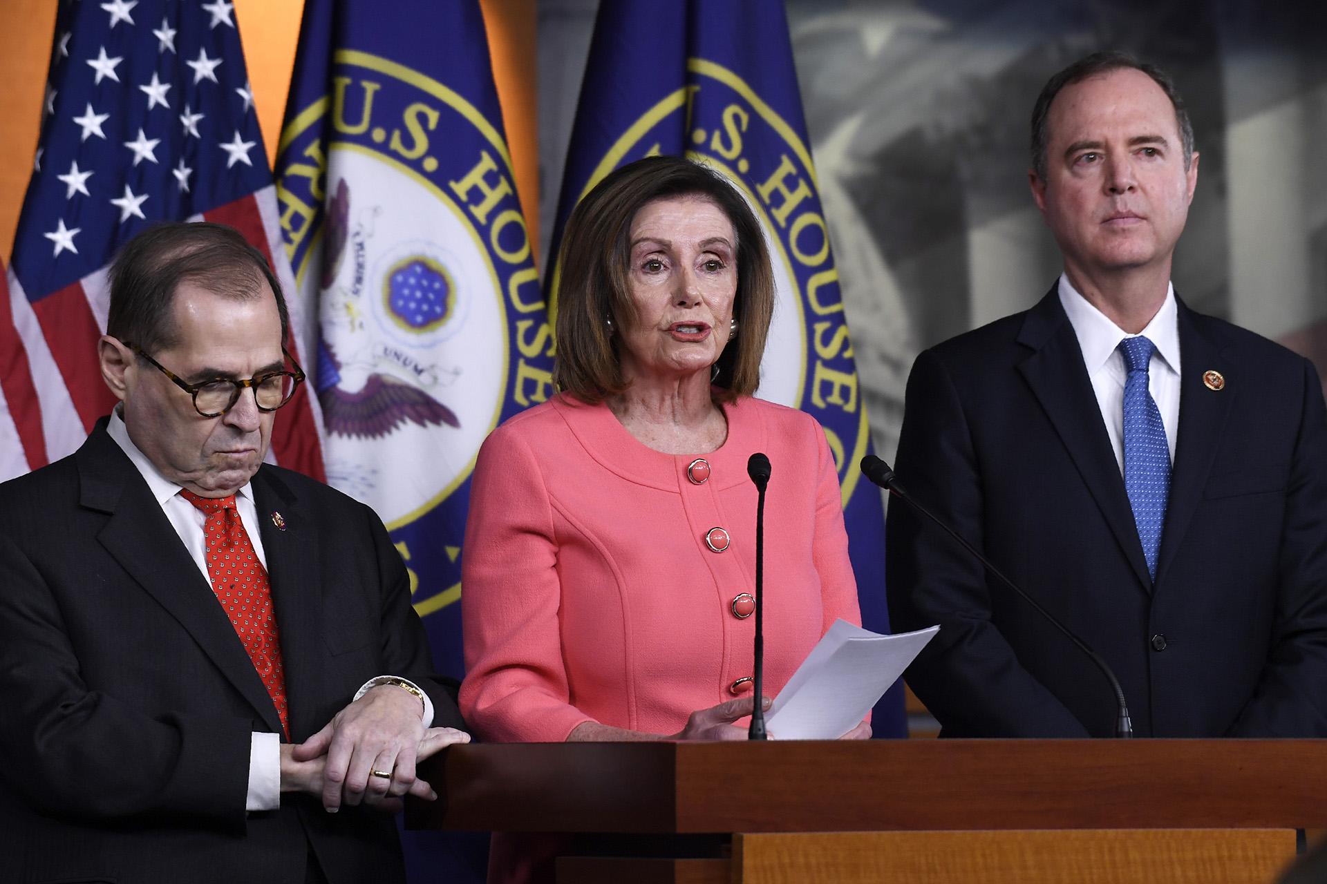House Speaker Nancy Pelosi of Calif., center, flanked by House Judiciary Committee Chairman Rep. Jerrold Nadler, D-N.Y., left, and House Intelligence Committee Chairman Rep. Adam Schiff, D-Calif., speaks during a news conference to announce impeachment managers on Capitol Hill in Washington, Wednesday, Jan. 15, 2020. (AP Photo / Susan Walsh)