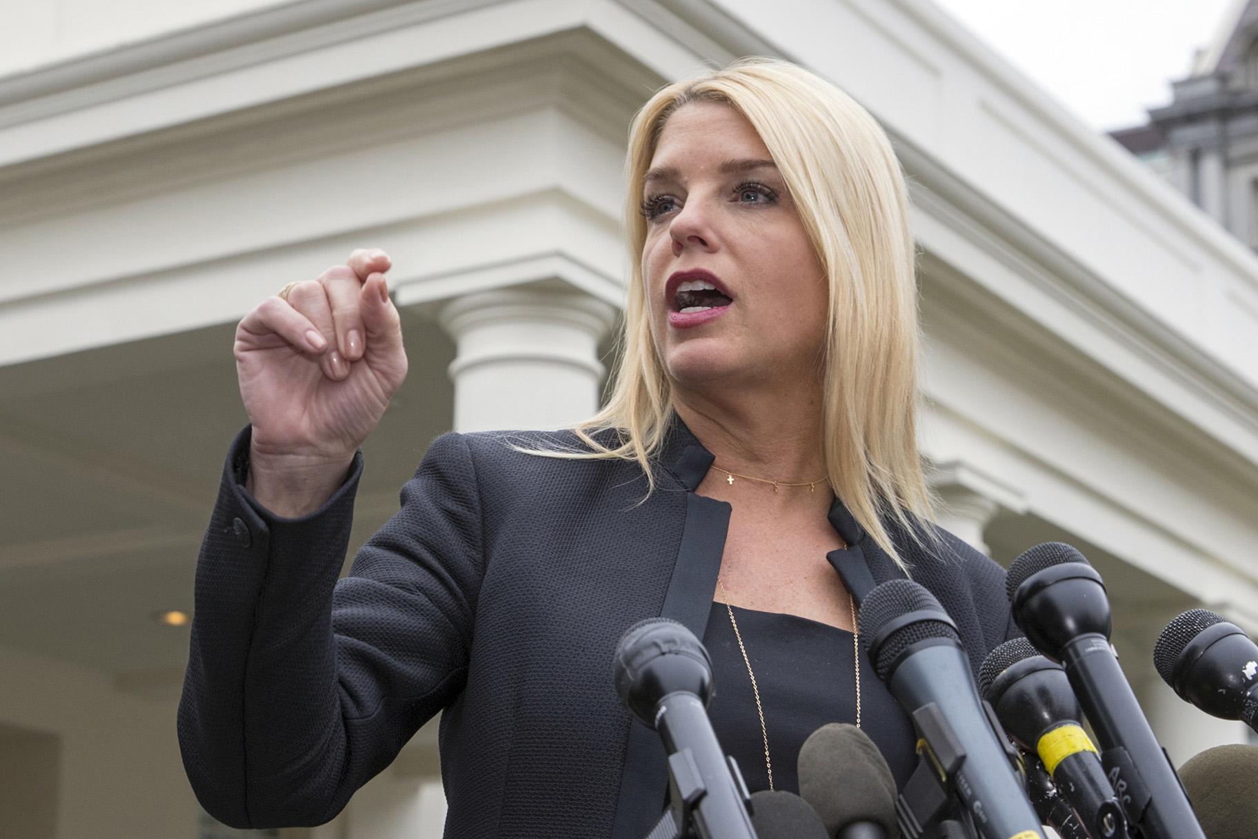 In this Feb. 22, 2018 file photo, Florida Attorney General Pam Bondi speaks to reporters outside the West Wing in Washington. (AP Photo / J. Scott Applewhite)
