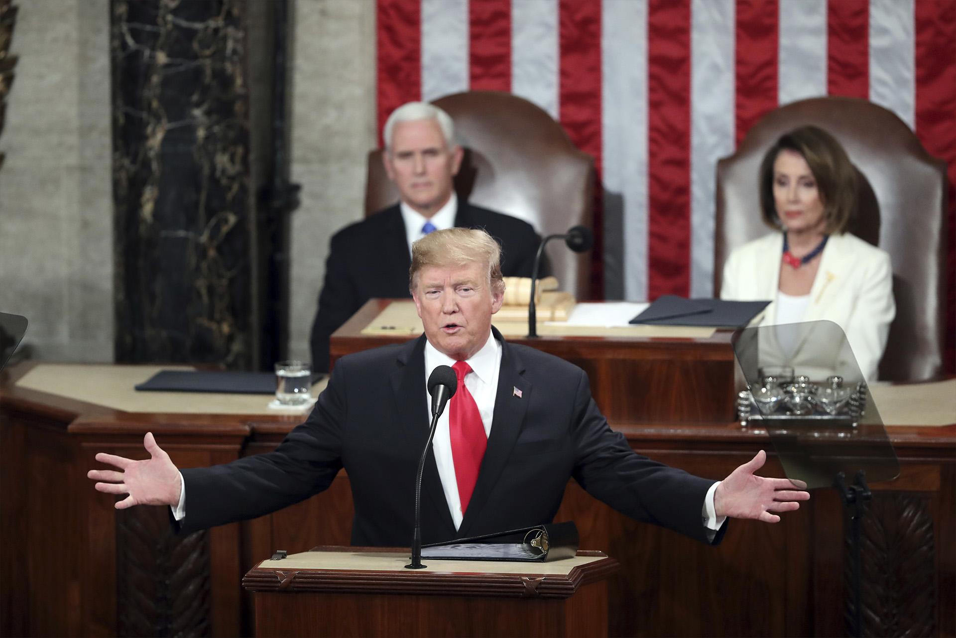 In this Feb. 5, 2019, file photo, President Donald Trump delivers his State of the Union address to a joint session of Congress on Capitol Hill in Washington, as Vice President Mike Pence and Speaker of the House Nancy Pelosi, D-Calif., watch. (AP Photo / Andrew Harnik, File)