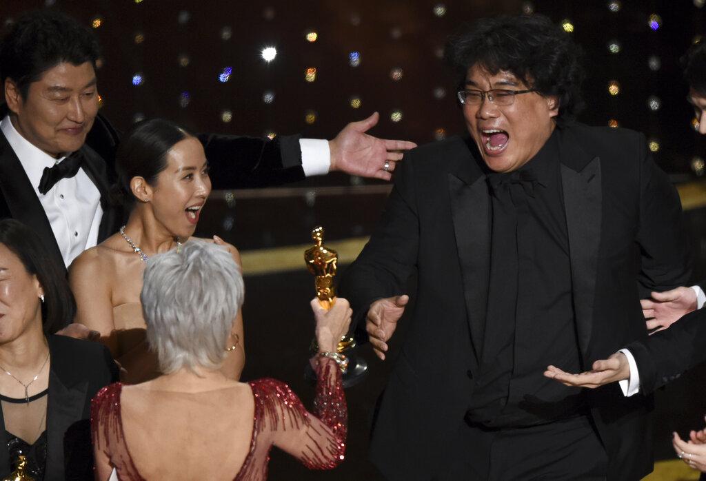 Bong Joon Ho, right, reacts as he is presented with the award for best picture for “Parasite” from presenter Jane Fonda at the Oscars on Sunday, Feb. 9, 2020, at the Dolby Theatre in Los Angeles. Looking on from left are Kang-Ho Song and Kwak Sin Ae. (AP Photo / Chris Pizzello)