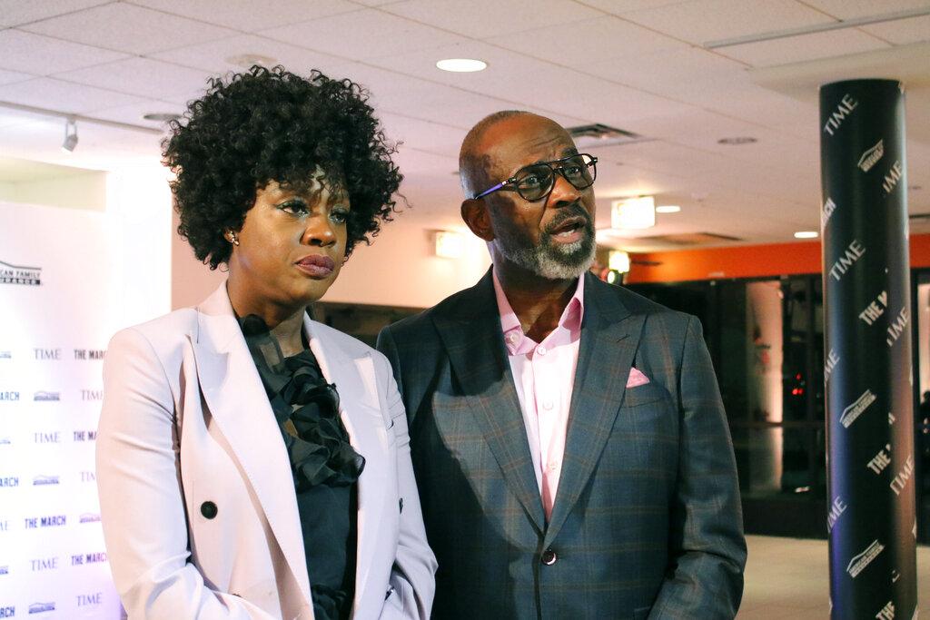 In this Wednesday, Feb. 26, 2020 photo, actress Viola Davis, left, and her husband, Julius Tennon speak to reporters ahead of the launch of a virtual reality exhibit depicting Martin Luther King Jr.’s “I Have a Dream” speech at the DuSable Museum of African American History. (AP Photo / Noreen Nasir)