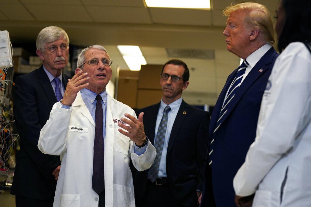 President Donald Trump listens as he tours the Viral Pathogenesis Laboratory at the National Institutes of Health, Tuesday, March 3, 2020, in Bethesda, Md. (AP Photo / Evan Vucci)