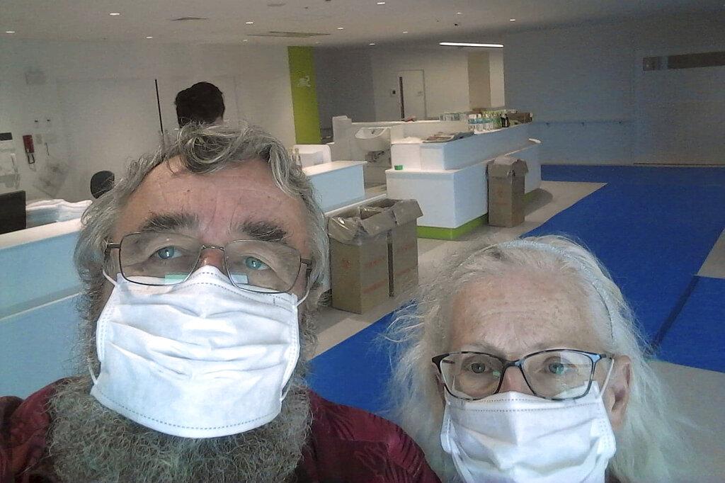 This Feb. 24, 2020 photo provided by Greg and Rose Yerex shows them in a hospital in Nagoya, Japan. Former passengers of the cruise ship Diamond Princess, they both tested positive for the coronavirus. (Greg Yerex via AP)