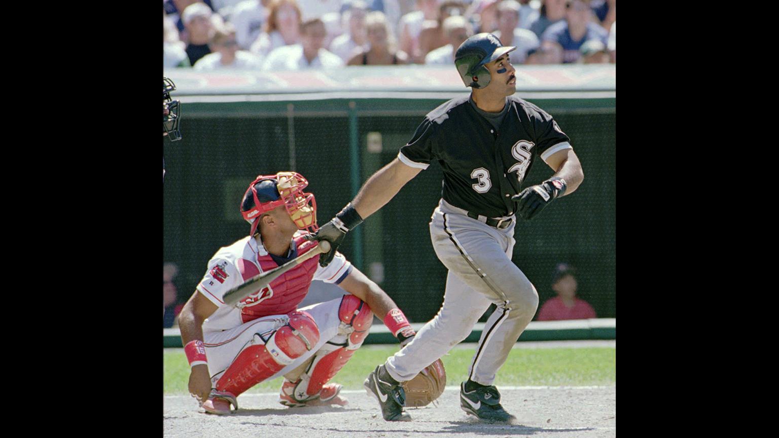 In this July 6, 1996, file photo, Chicago White Sox's Harold Baines (3) watches his ninth inning solo home run head for the center field seats during the White Sox's 3-2 win over the Cleveland Indians. (Jeff Glidden / AP File Photo)