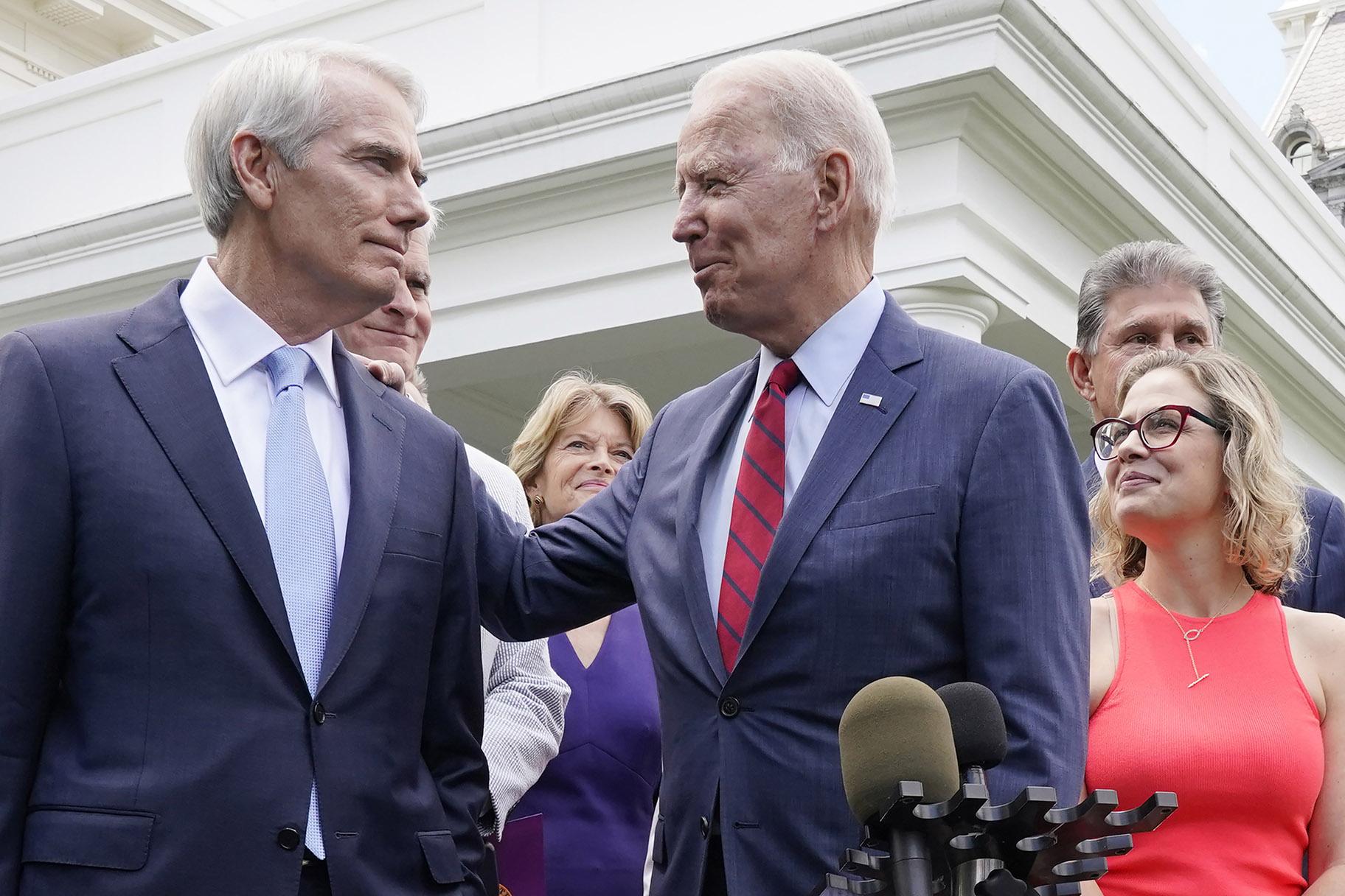 President Joe Biden speaks with Sen. Rob Portman, R-Ohio, and other bipartisan group of senators, Thursday June 24, 2021, outside the White House in Washington. (AP Photo / Jacquelyn Martin)