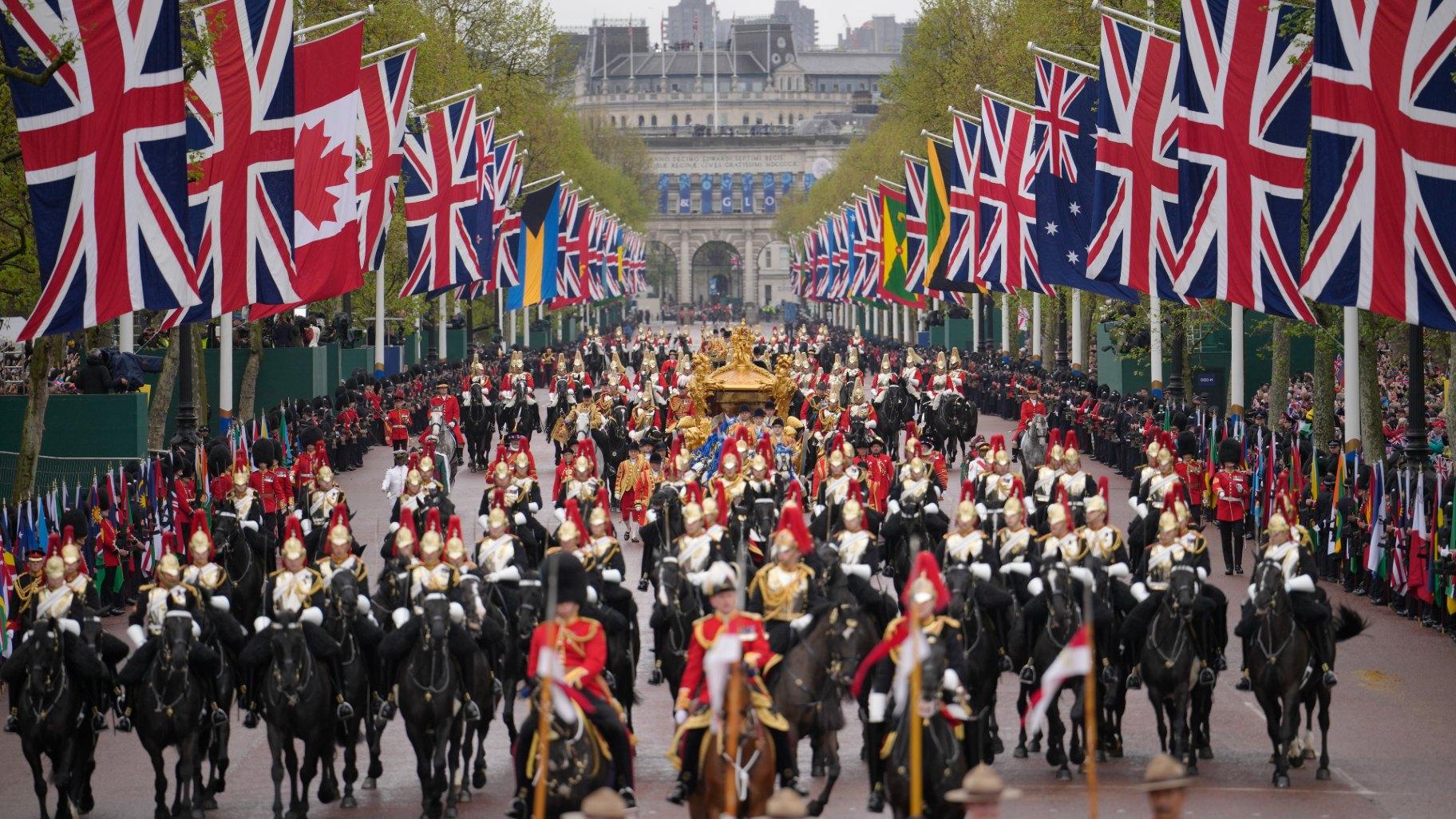 The procession is on the way to Buckingham Palace after coronation ceremony for Britain's King Charles III and Queen Camilla in London, Saturday, May 6, 2023. (AP Photo / Vadim Ghirda)