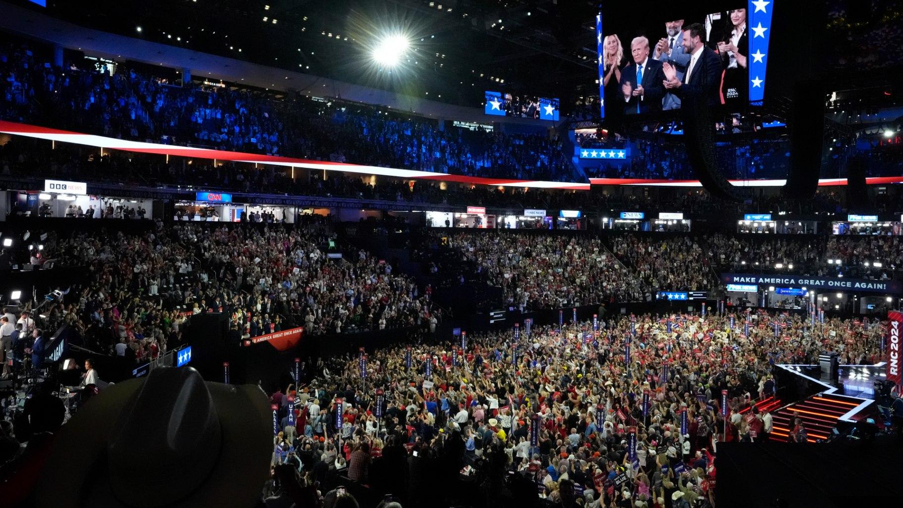 Republican presidential candidate former President Donald Trump applauds with Republican vice presidential candidate U.S. Sen. J.D. Vance, R-Ohio, during the Republican National Convention Tuesday, July 16, 2024, in Milwaukee. (Nam Y. Huh / AP Photo)
