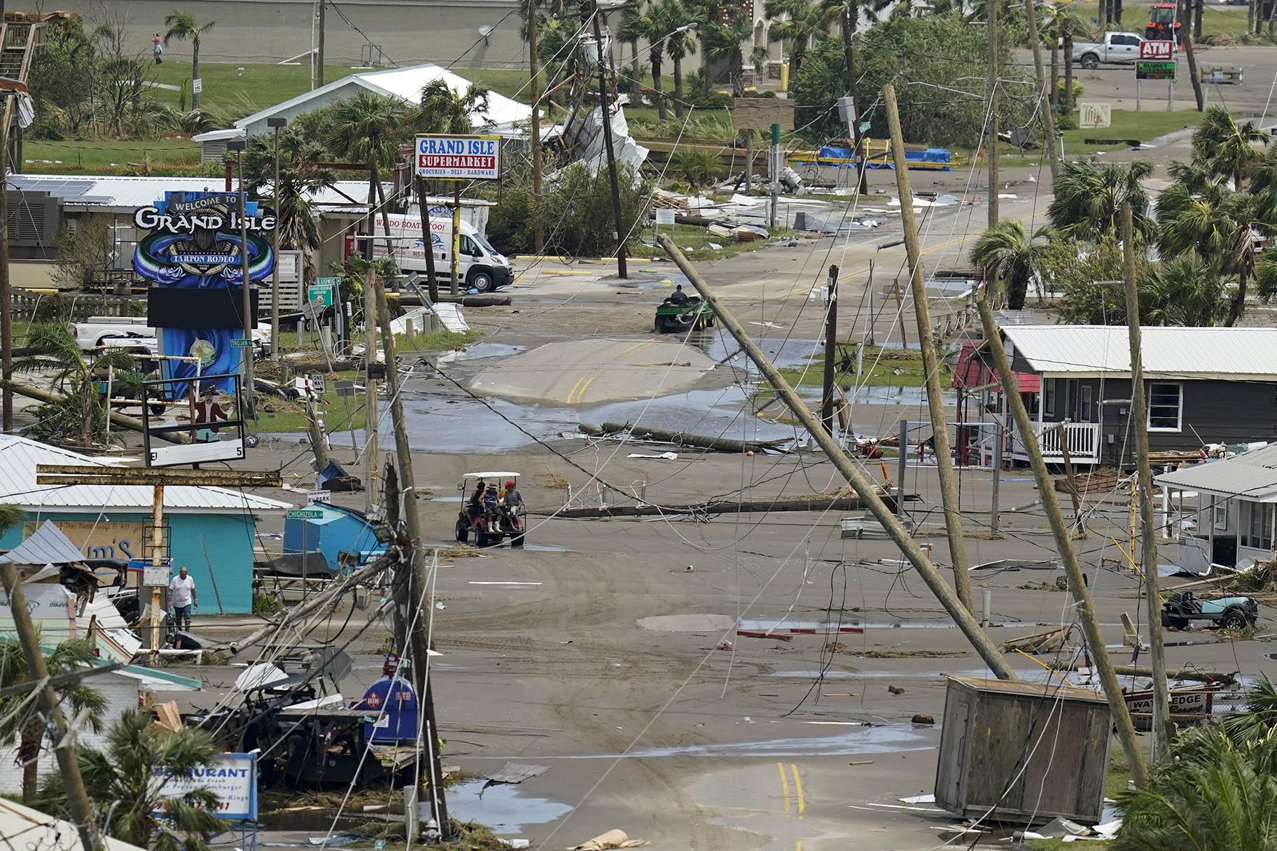 The remains of destroyed homes and businesses are seen in the aftermath of Hurricane Ida in Grand Isle, La., Tuesday, Aug. 31, 2021. (AP Photo / Gerald Herbert)