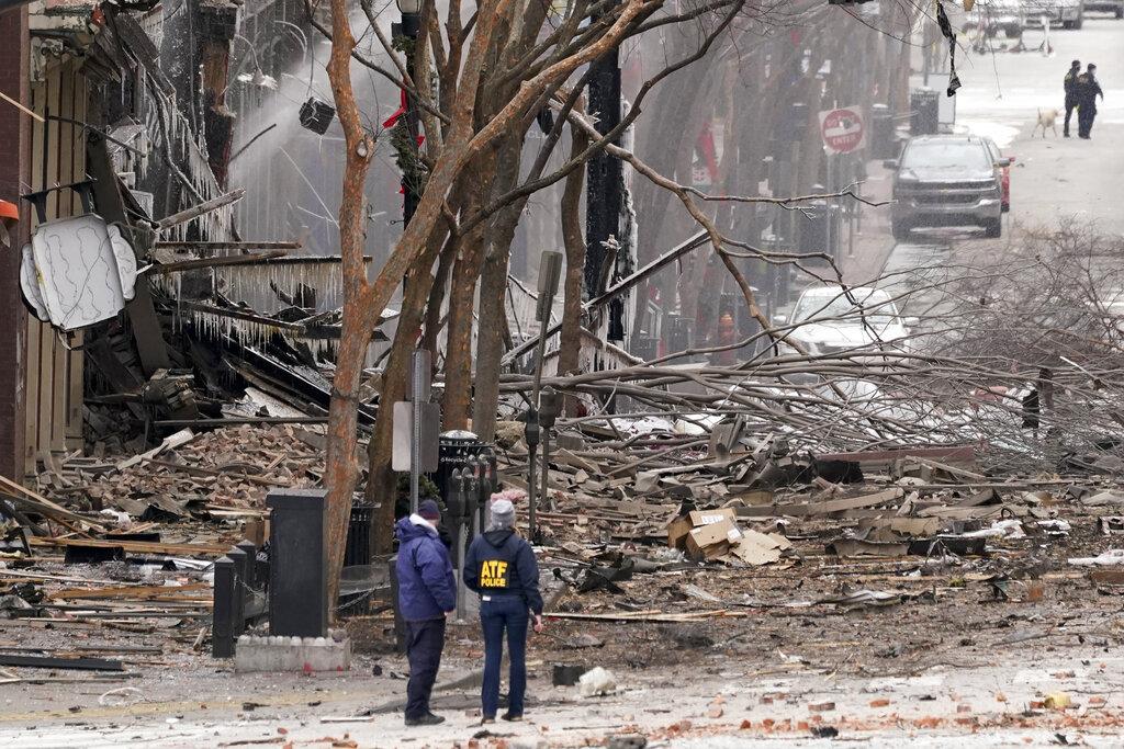 Emergency personnel work near the scene of an explosion in downtown Nashville, Tenn., Friday, Dec. 25, 2020. Buildings shook in the immediate area and beyond after a loud boom was heard early Christmas morning.(AP Photo / Mark Humphrey)