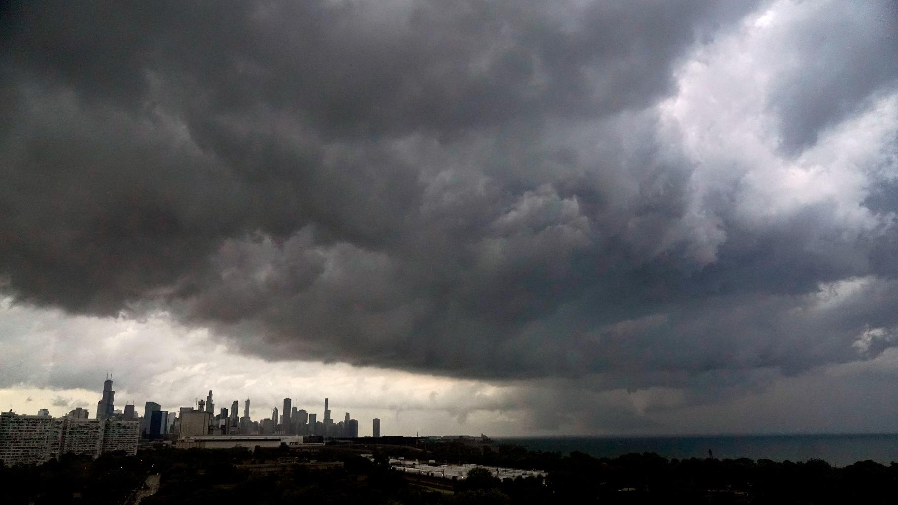 Storm clouds pass over downtown Chicago and the Bronzeville neighborhood of the city heading East out over Lake Michigan as the National Weather Service continued to issue multiple tornado warnings in the greater metropolitan area Wednesday, July 12, 2023. (AP Photo / Charles Rex Arbogast)