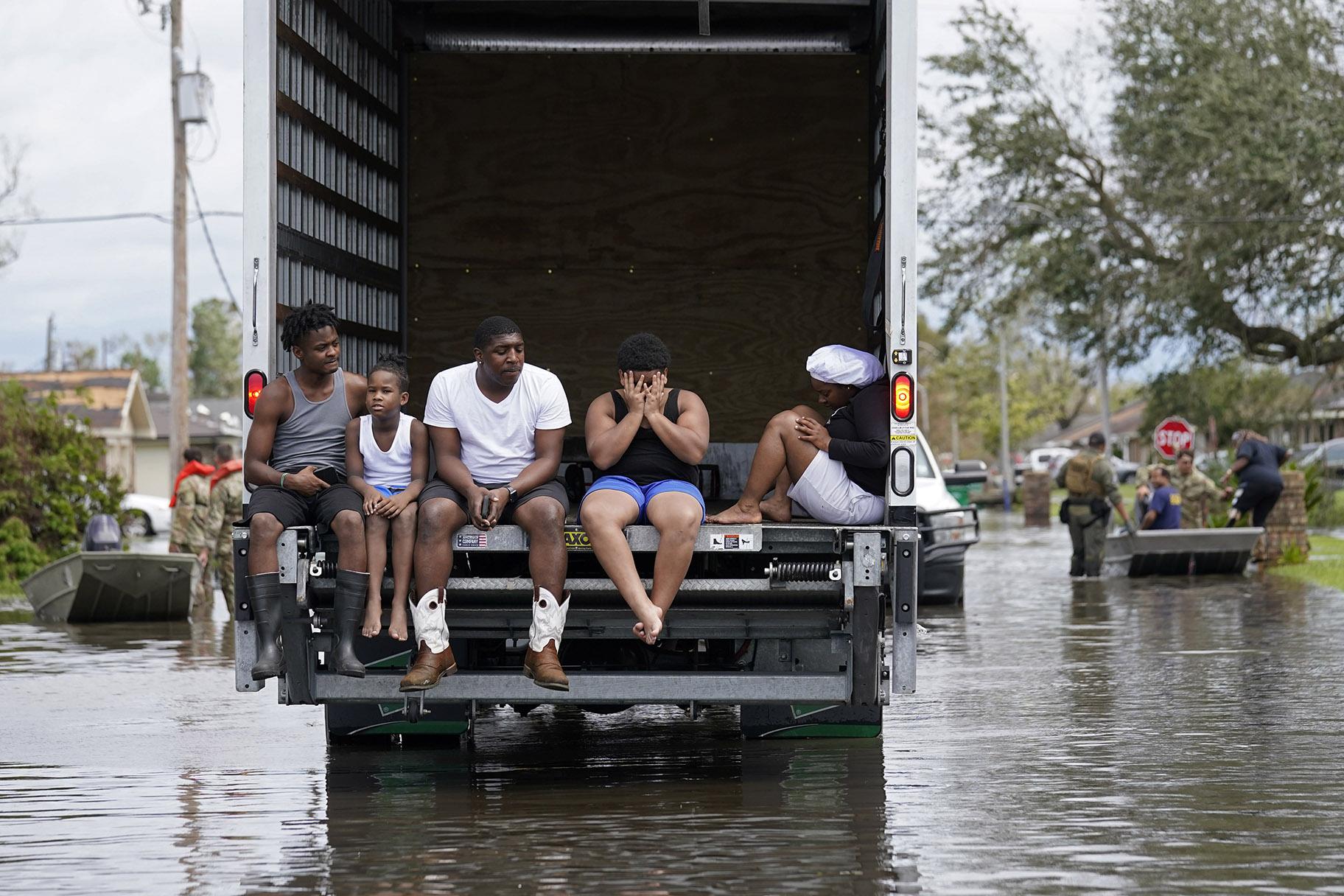 People are evacuated from floodwaters in the aftermath of Hurricane Ida in LaPlace, La., Monday, Aug. 30, 2021. (AP Photo / Gerald Herbert)