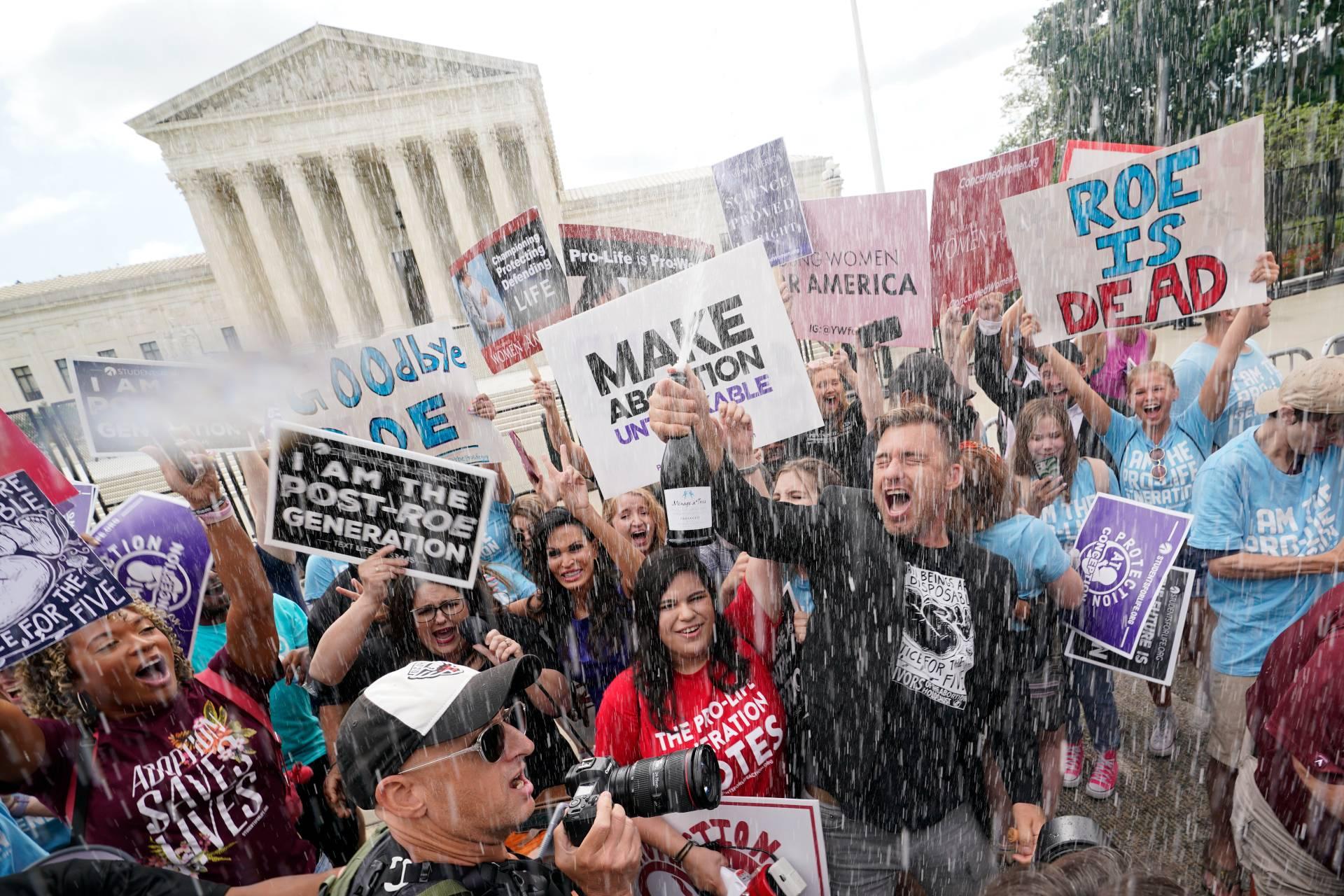 A celebration outside the Supreme Court, Friday, June 24, 2022, in Washington. The Supreme Court has ended constitutional protections for abortion that had been in place nearly 50 years — a decision by its conservative majority to overturn the court's landmark abortion cases. (AP Photo / Steve Helber)