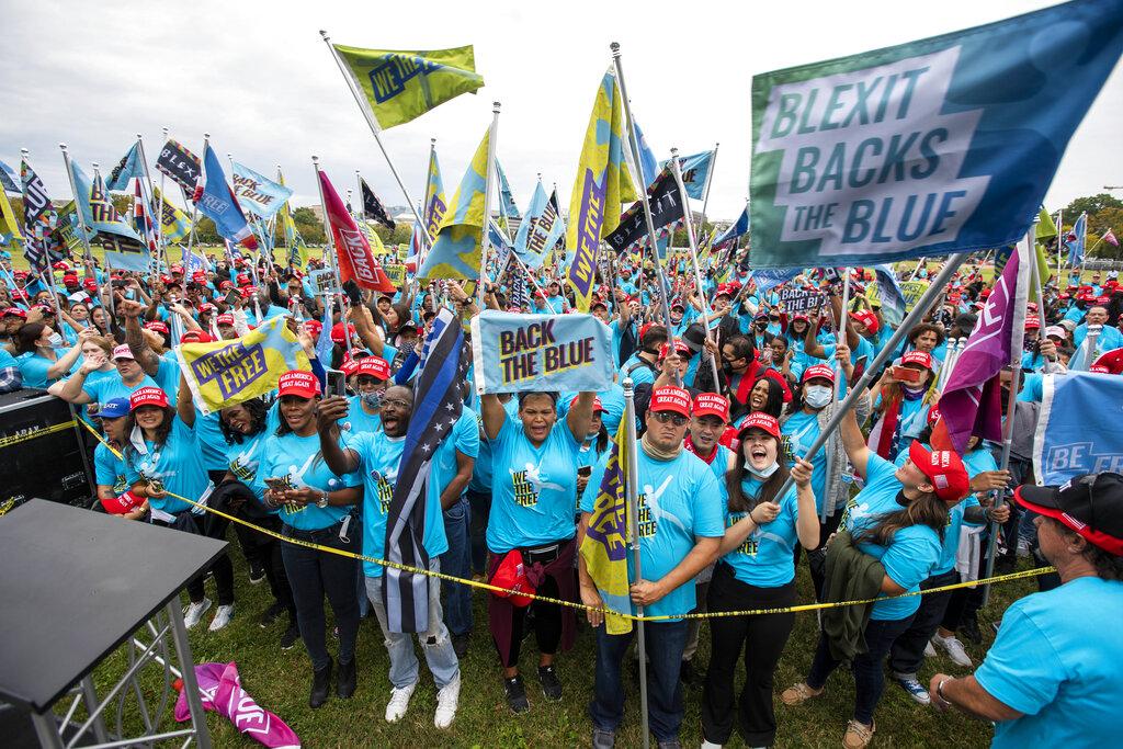 Supporters of President Donald Trump rally at The Ellipse before entering to The White House, where Trump held an event on the South lawn on Saturday, Oct. 10, 2020, in Washington. (AP Photo / Jose Luis Magana)