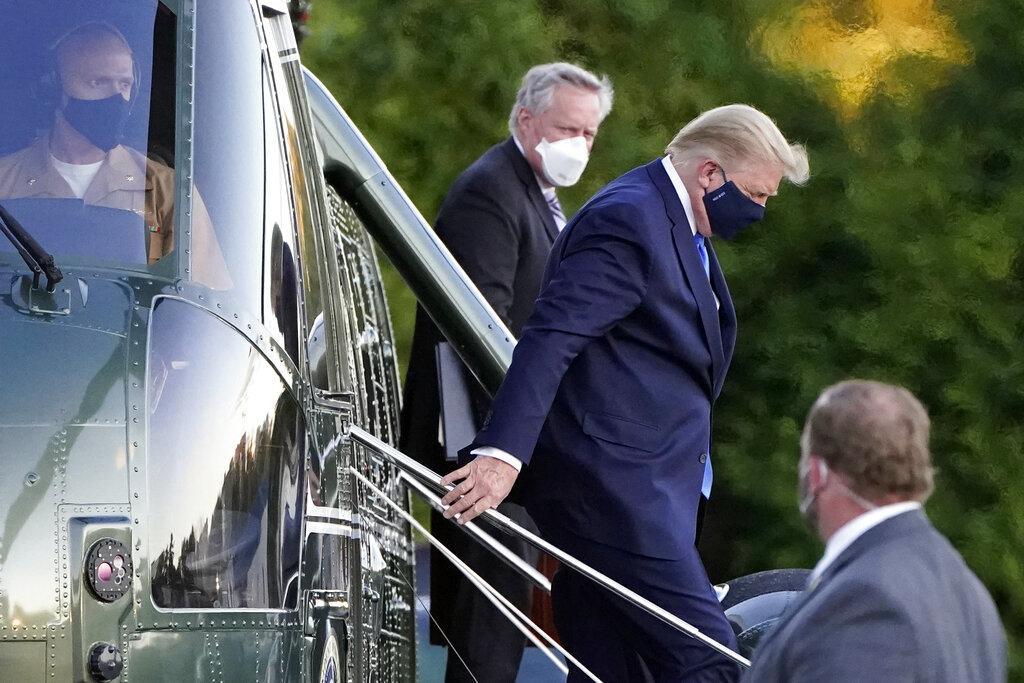 President Donald Trump arrives at Walter Reed National Military Medical Center, in Bethesda, Md., Friday, Oct. 2, 2020, on Marine One helicopter after he tested positive for COVID-19. (AP Photo / Jacquelyn Martin)