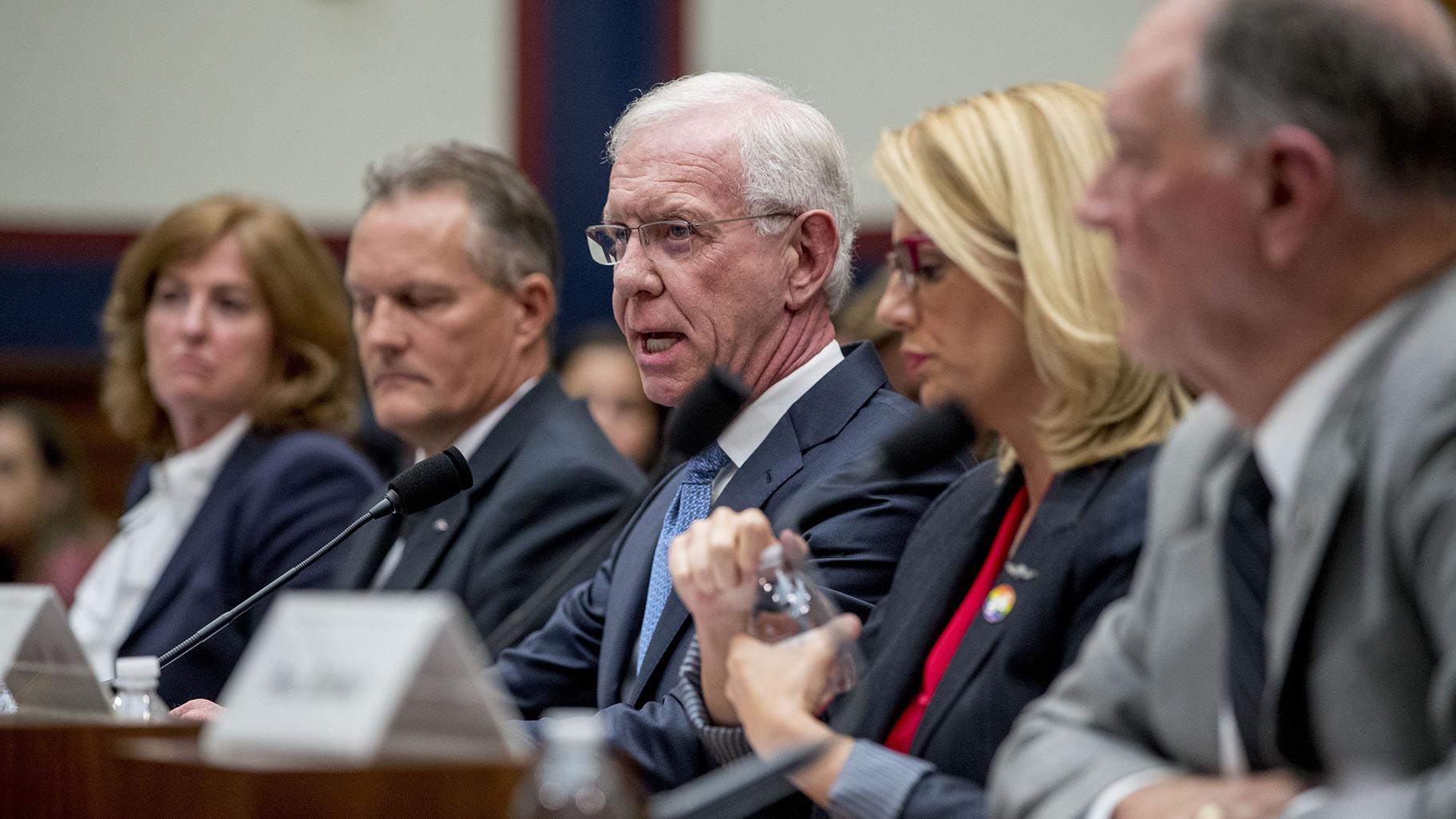 Captain Chesley “Sully” Sullenberger, accompanied by, from left, Sharon Pinkerton with Airlines for America, Captain Dan Carey with the Allied Pilots Association, Sara Nelson with the Association of Flight Attendants-CWA, and former Federal Aviation Administration Administrator Randy Babbitt, speaks during a House Committee on Transportation and Infrastructure hearing on the status of the Boeing 737 MAX on Capitol Hill in Washington, Wednesday, June 19, 2019. (AP Photo / Andrew Harnik)