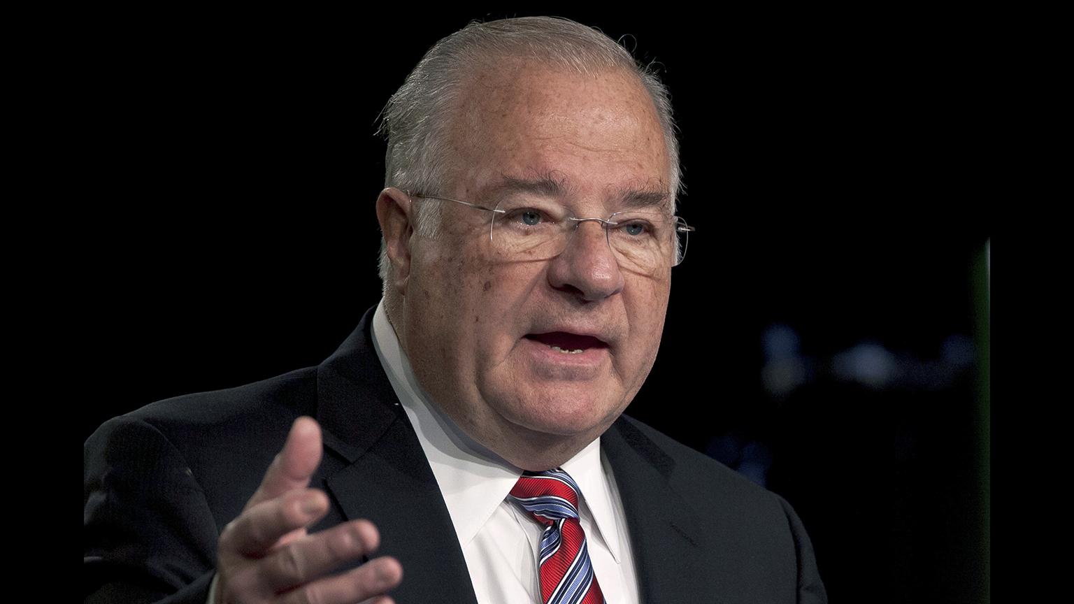 In this Feb. 14, 2012 file photo, online brokerage TD Ameritrade founder Joe Ricketts speaks during a ceremonial unveiling of his portrait which will hang in company headquarters in Omaha, Nebraska. (AP Photo / Nati Harnik, File)