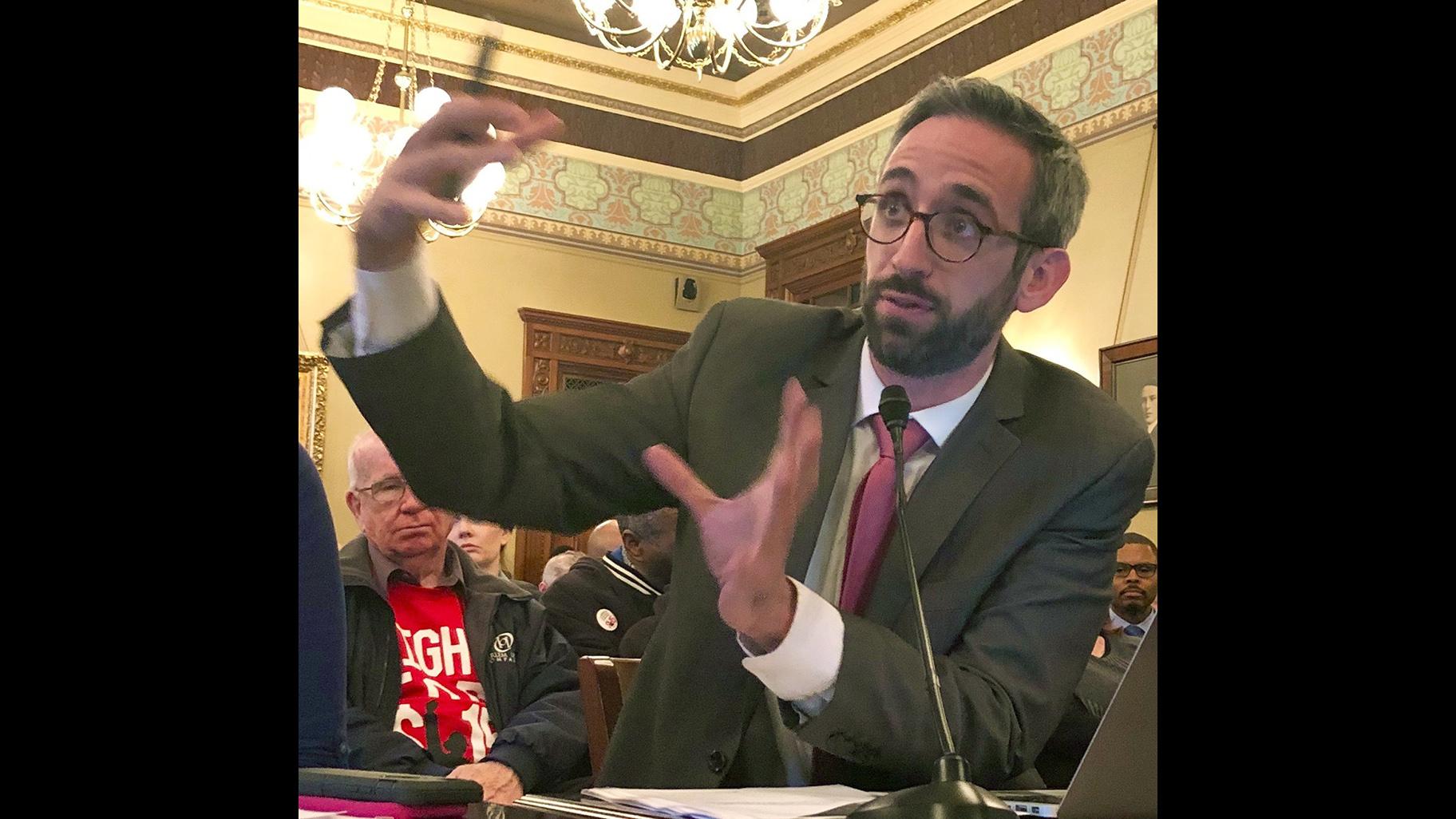 Illinois state Rep. Will Guzzardi, D-Chicago, testifies before the Labor and Commerce Committee on Wednesday, Feb. 13, 2019 on his proposal to increase the minimum wage to $15 by 2025. (AP Photo / John O’Connor)