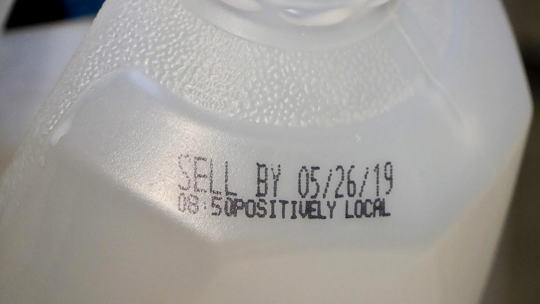 This Friday, May 24, 2019 photo shows the “sell by” date for a jug of milk in New York. In May 2019, U.S. regulators are again urging food makers to reduce the variety of terms like “best by” and “use by” that cause confusion about when food should be thrown out. (AP Photo / Bebeto Matthews)