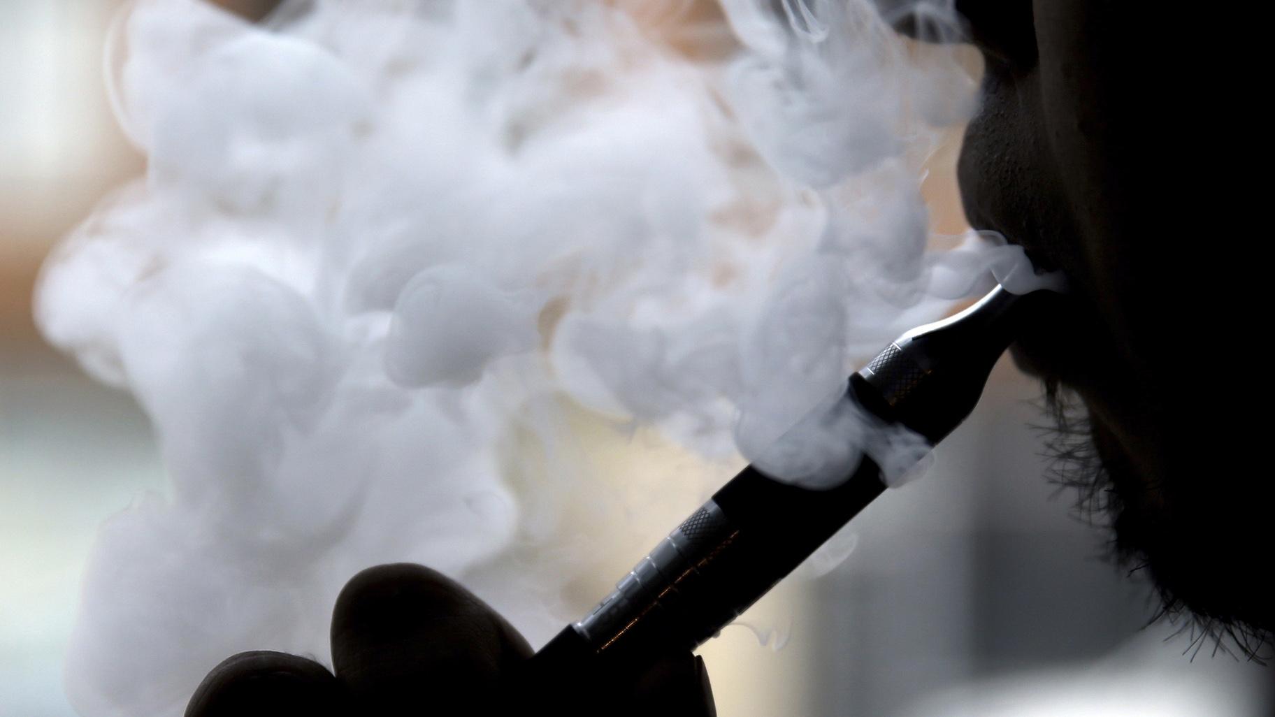 In this April 23, 2014 file photo, a man smokes an electronic cigarette in Chicago. (AP Photo / Nam Y. Huh, File)