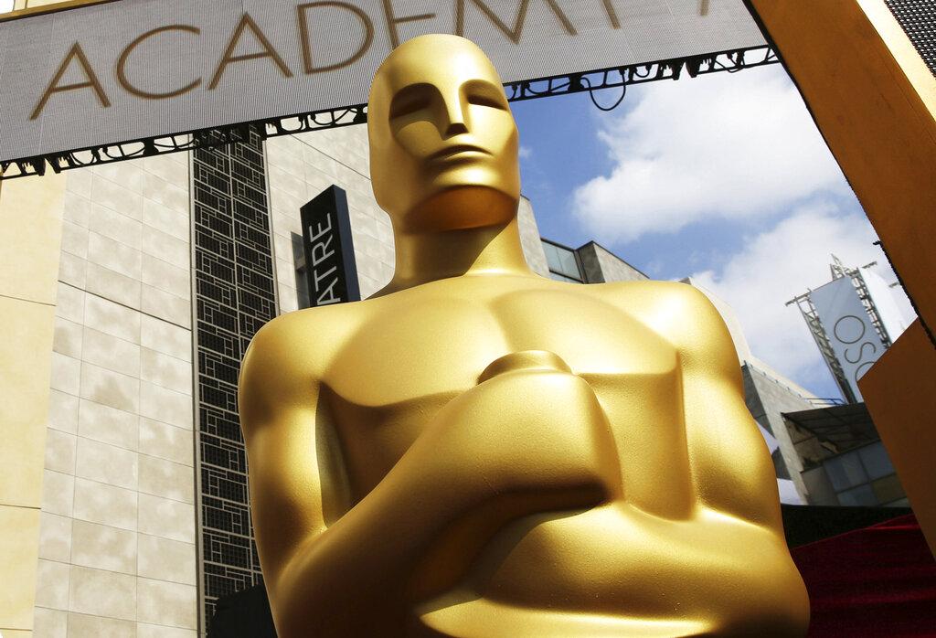 In this Feb. 21, 2015 file photo, an Oscar statue appears outside the Dolby Theatre for the 87th Academy Awards in Los Angeles. (Photo by Matt Sayles / Invision / AP, File)