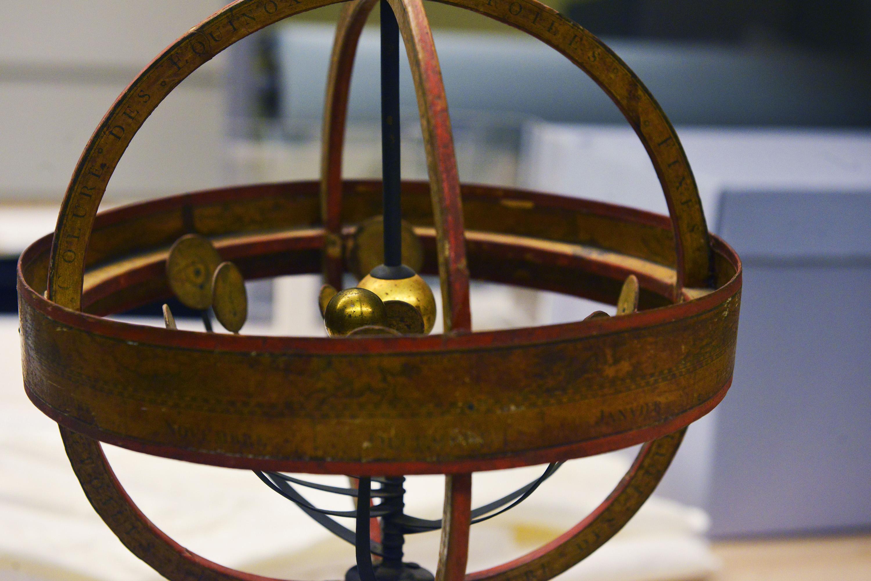 Known as the Copernican Armillary Sphere, this instrument is a rough representation of the heliocentric solar system, with the sun at the center. The object is part of Adler Planetarium's "What is a Planet?" exhibit. (Courtesy Adler Planetarium)