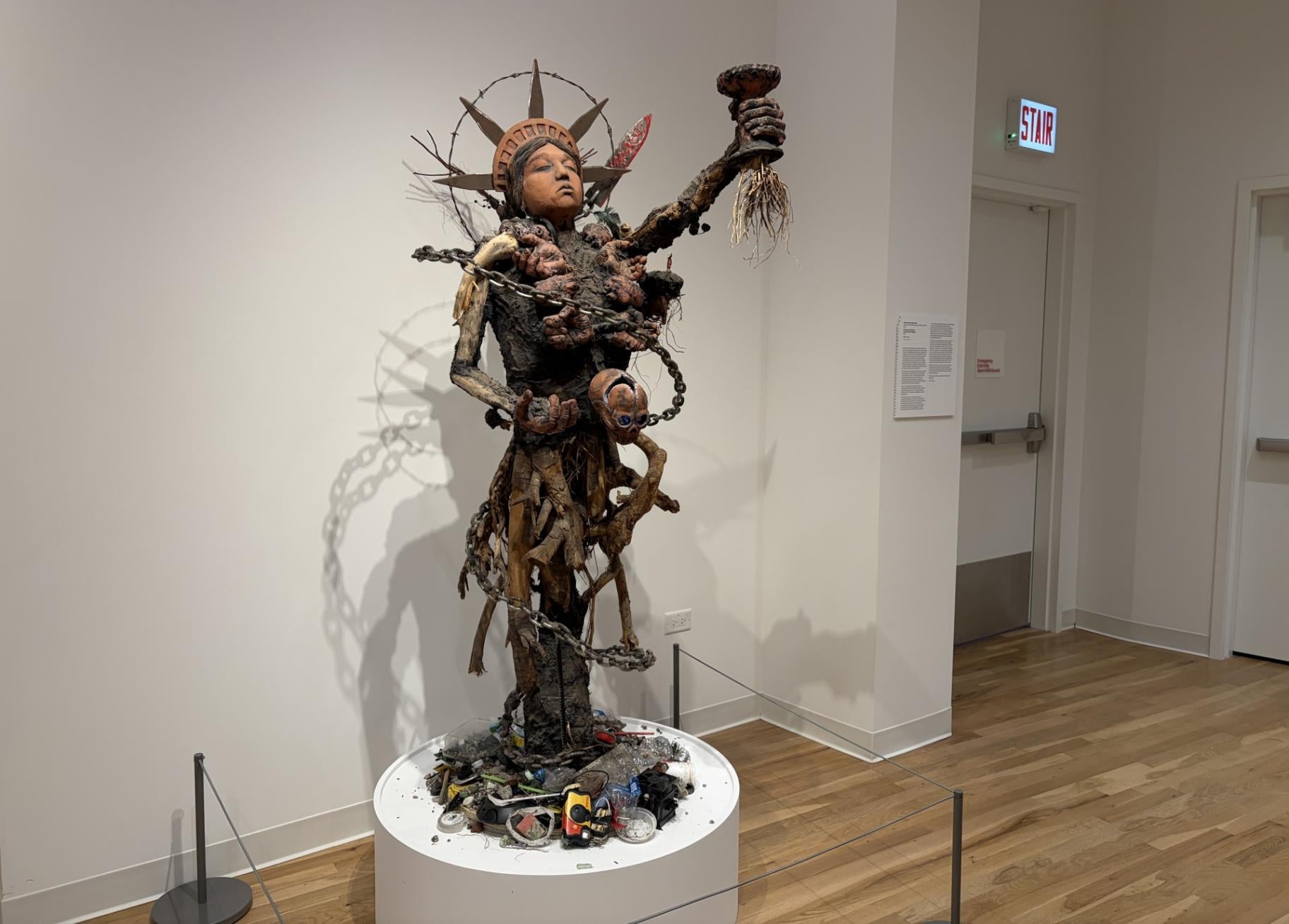 Mexican-born artist Alfonso “Piloto” Nieves Ruiz’s “In the Name of Progress” is on display at the Intuit Art Museum’s “Catalyst: Im/migration and Self-Taught Art in Chicago” exhibit. (Eunice Alpasan / WTTW News)